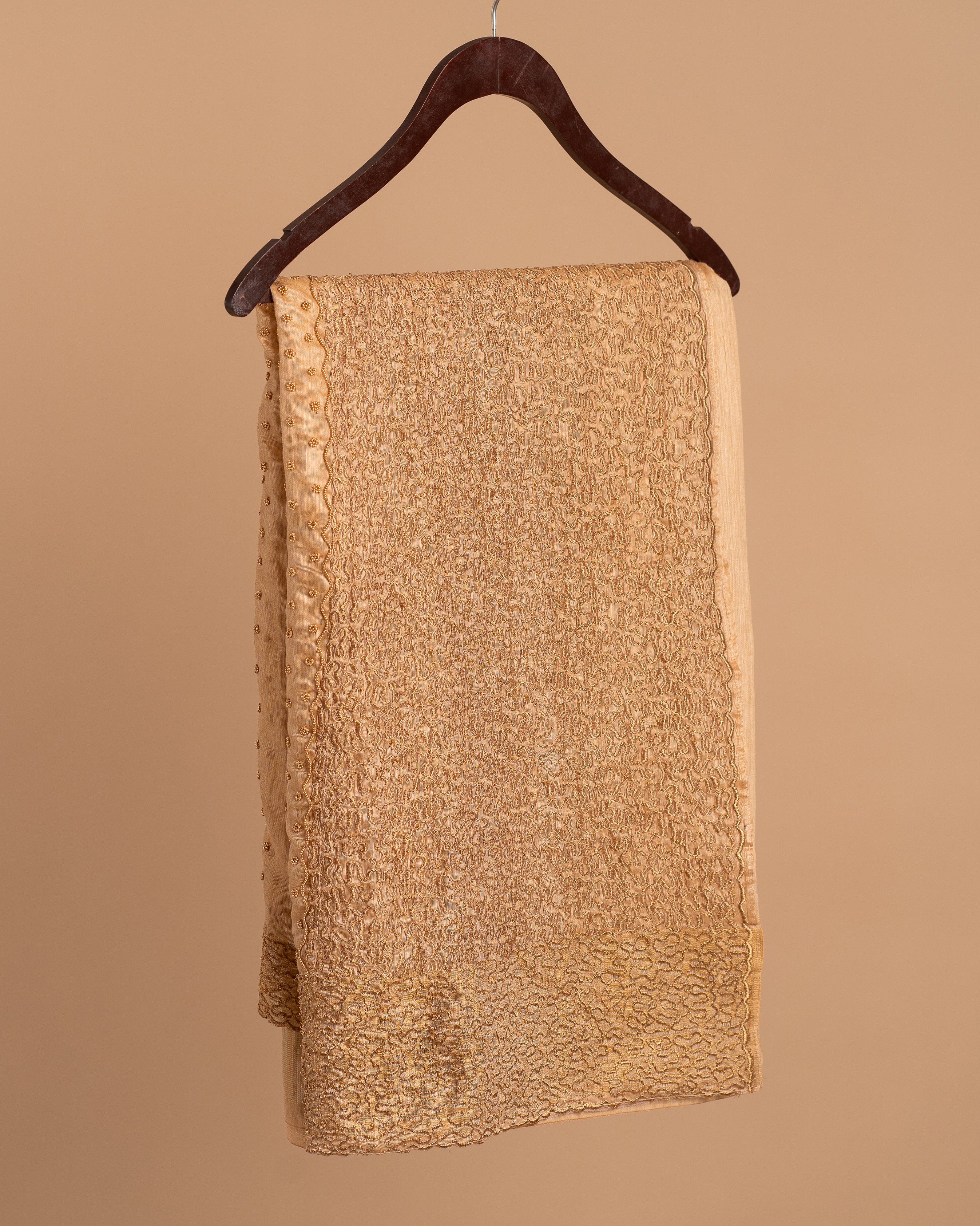 Antique gold saree with silk thread handwork and beads embroidery