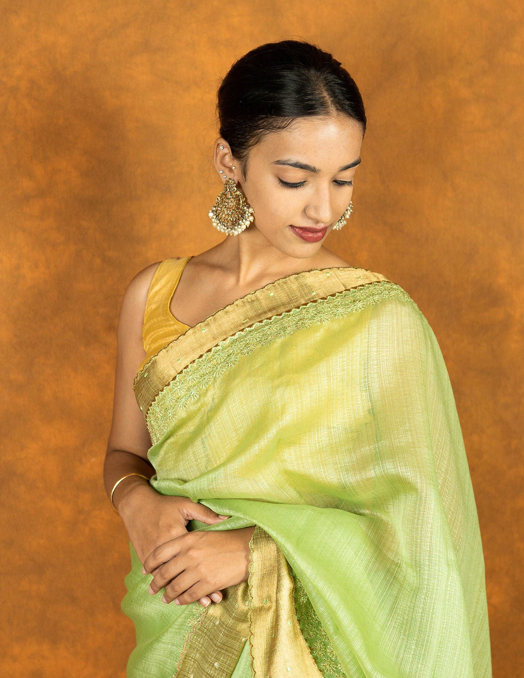 Green linen silk blend zari embroidered saree