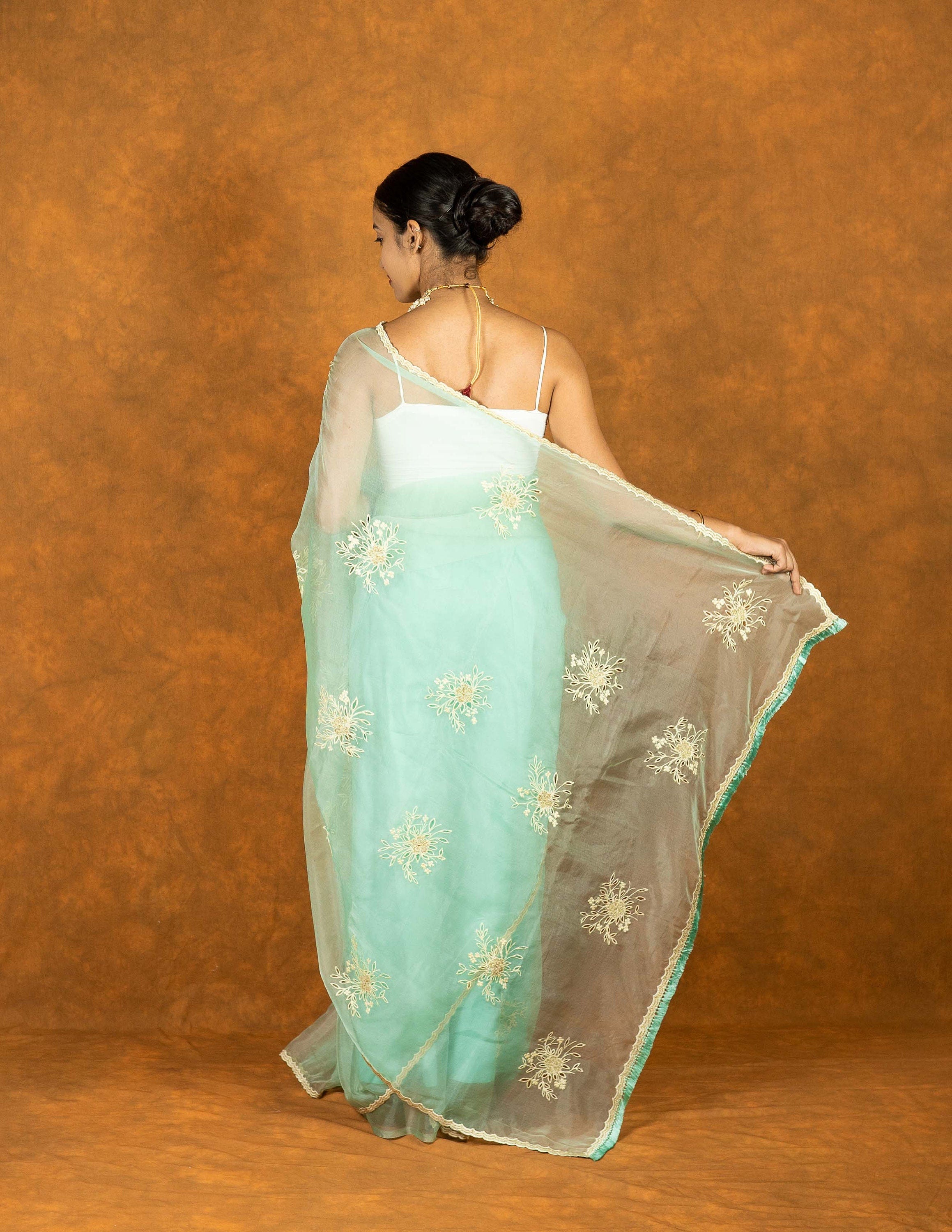 Electric blue organza silk hand embroidered saree