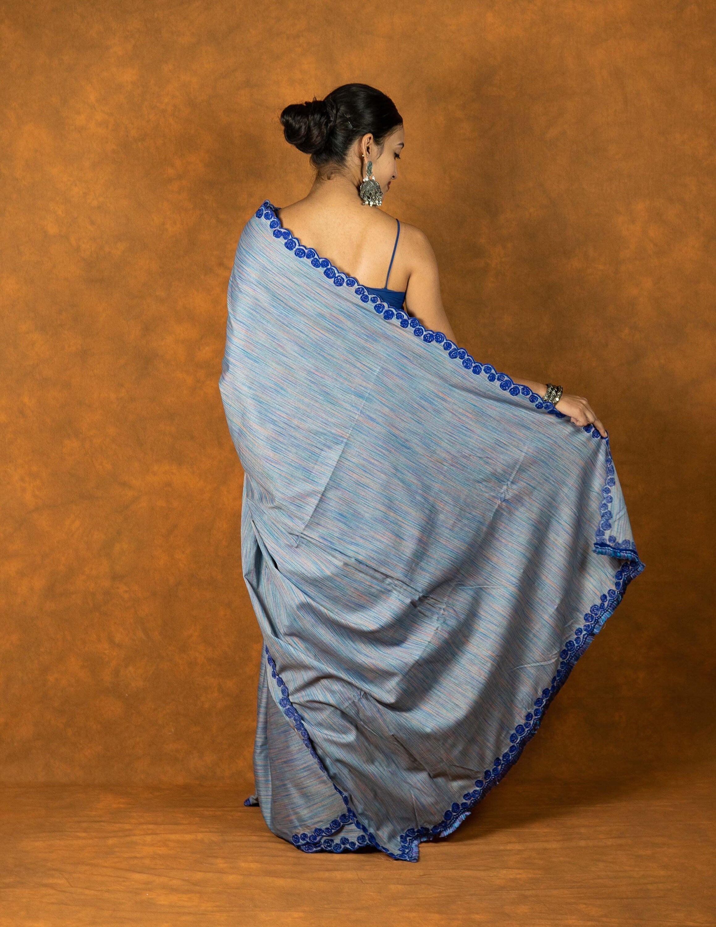 Blue Cotton Linen embroidered saree with tassels
