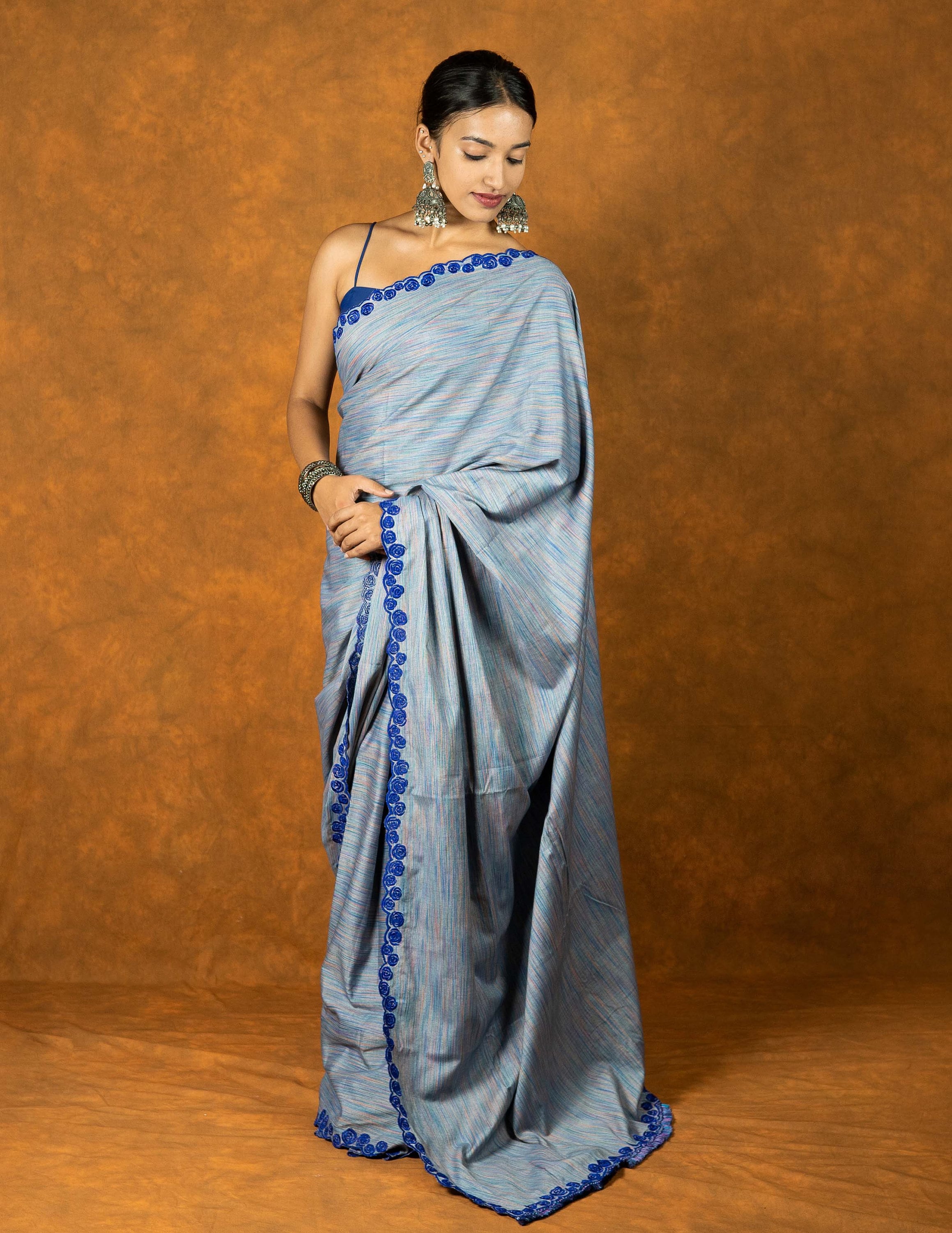Blue Cotton Linen embroidered saree with tassels