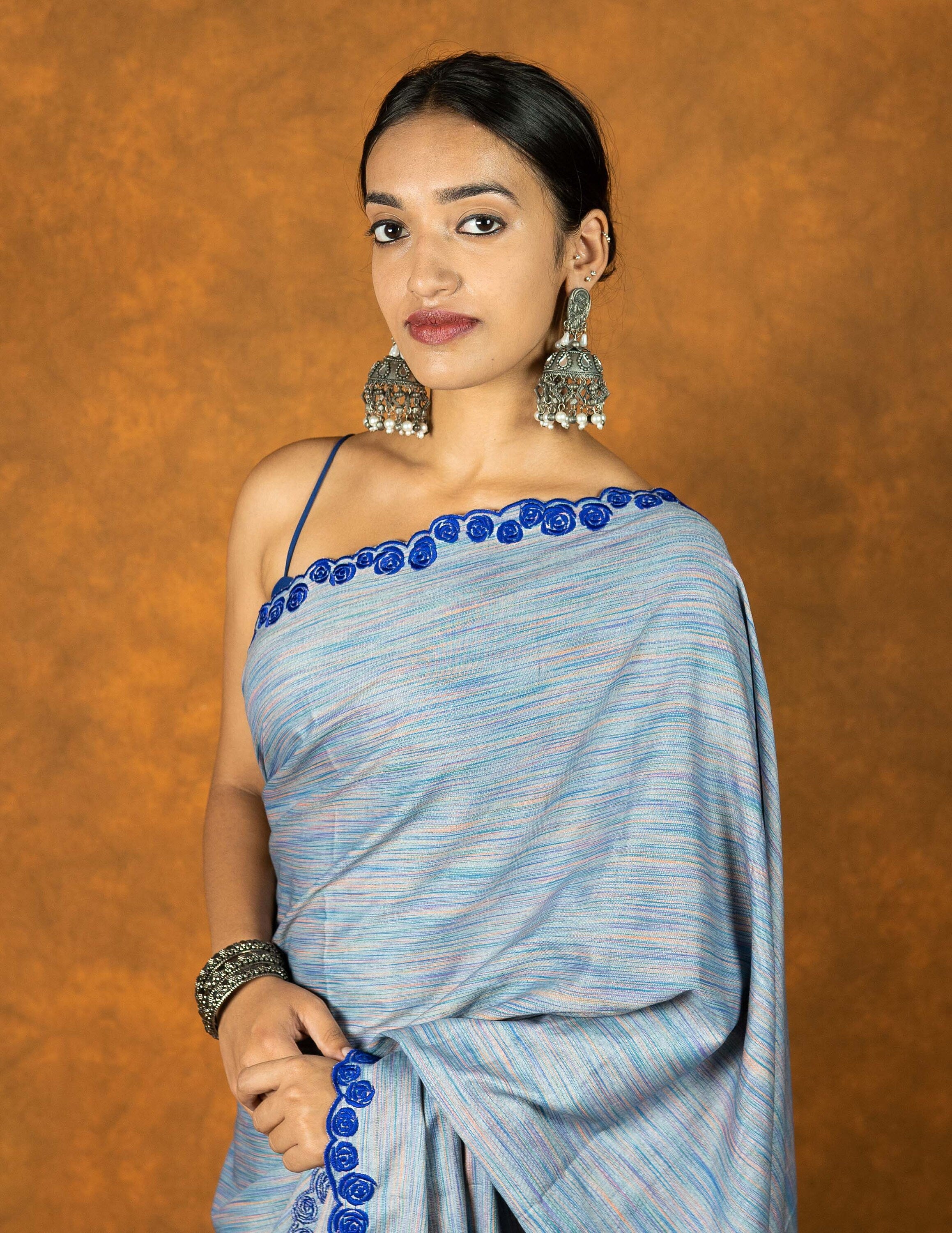 Blue Cotton Linen embroidered saree with tassels