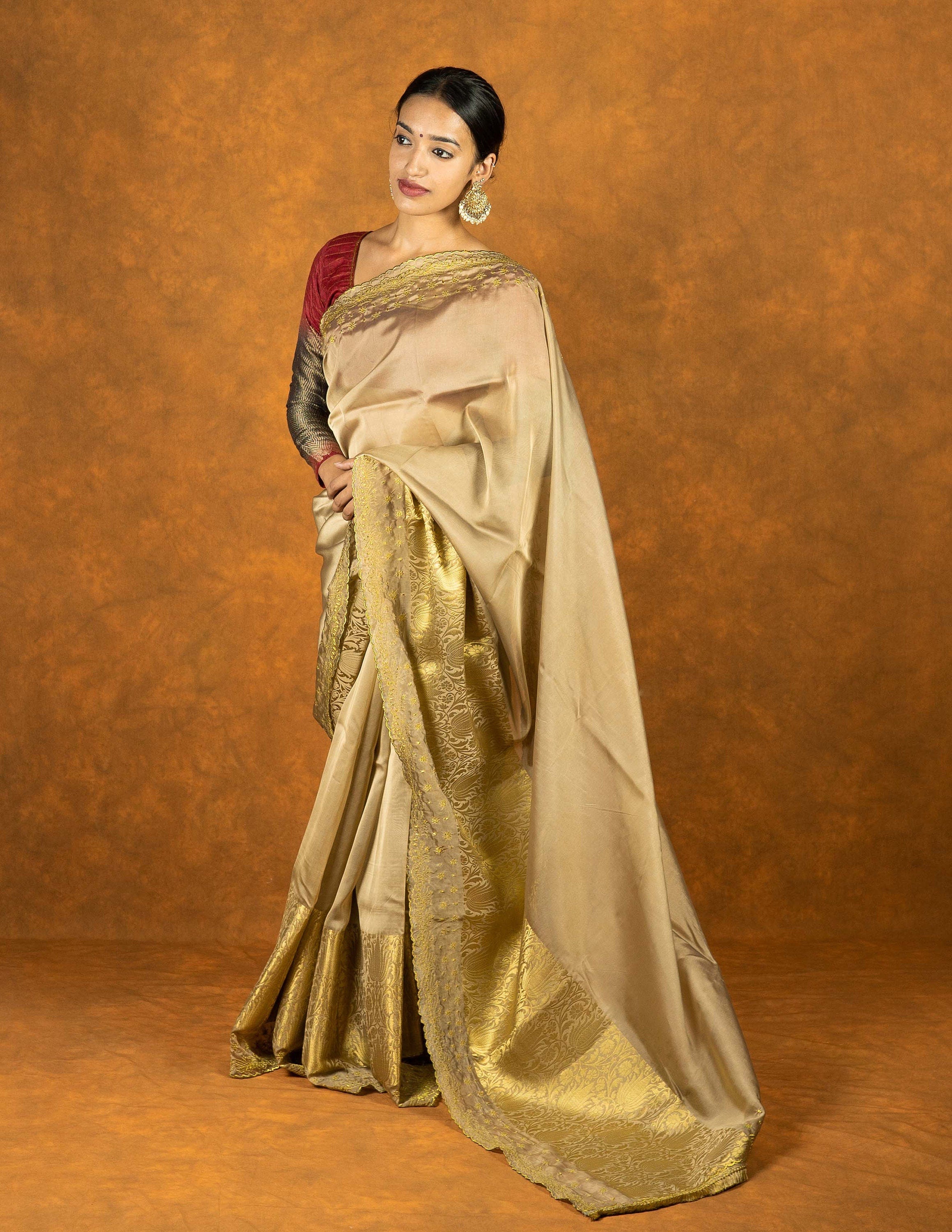 Gold and beige silk embroidered saree scallop and gold tassels
