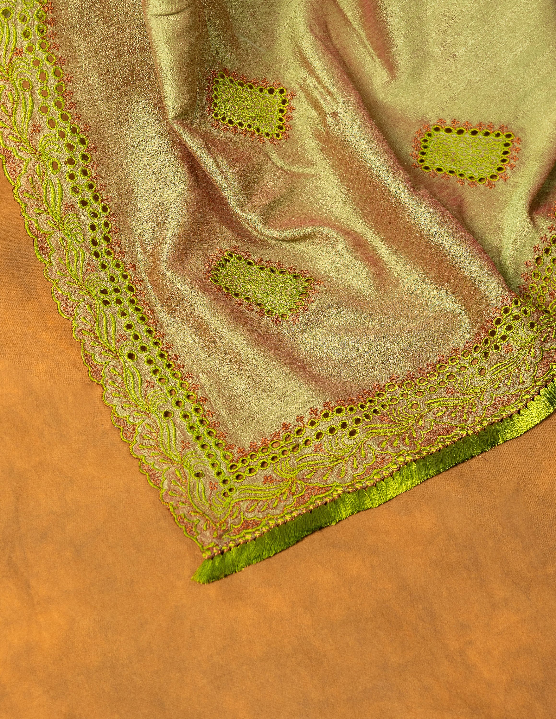 Green chinnon silk cutwork embroidered saree