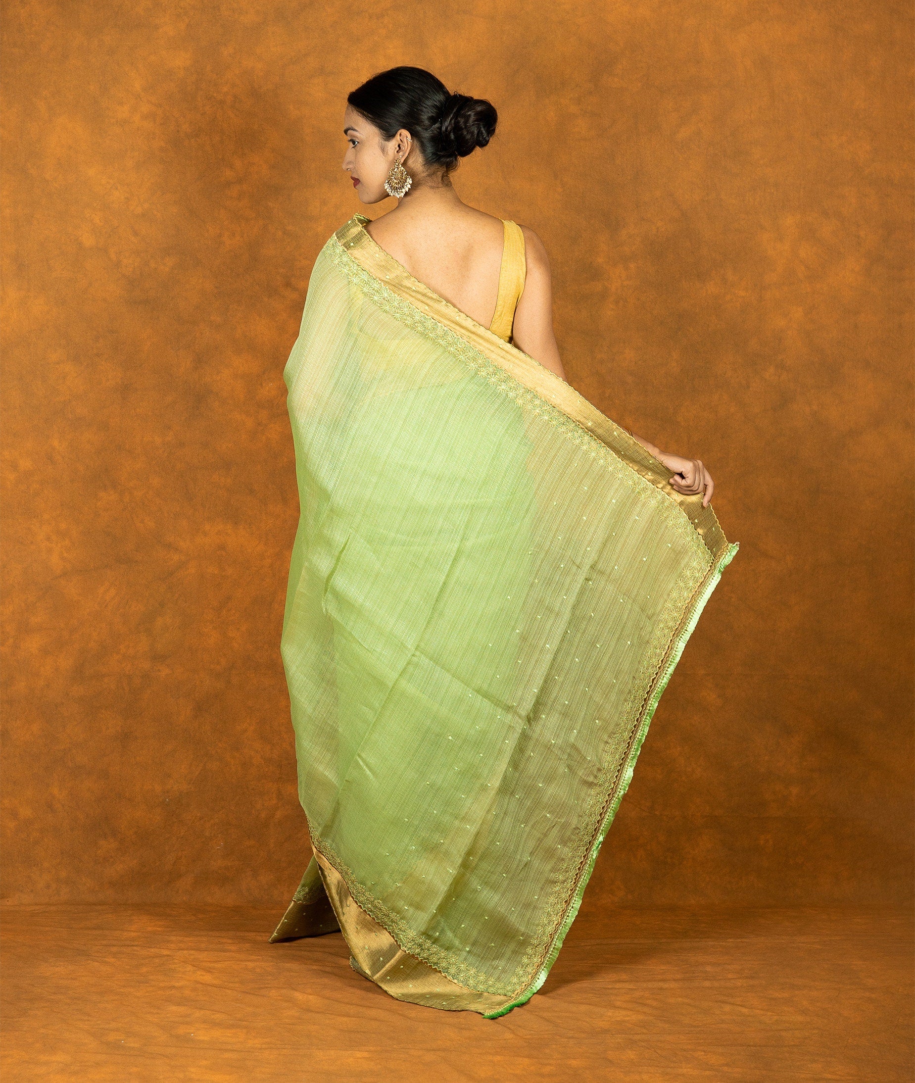 Green linen silk blend zari embroidered saree