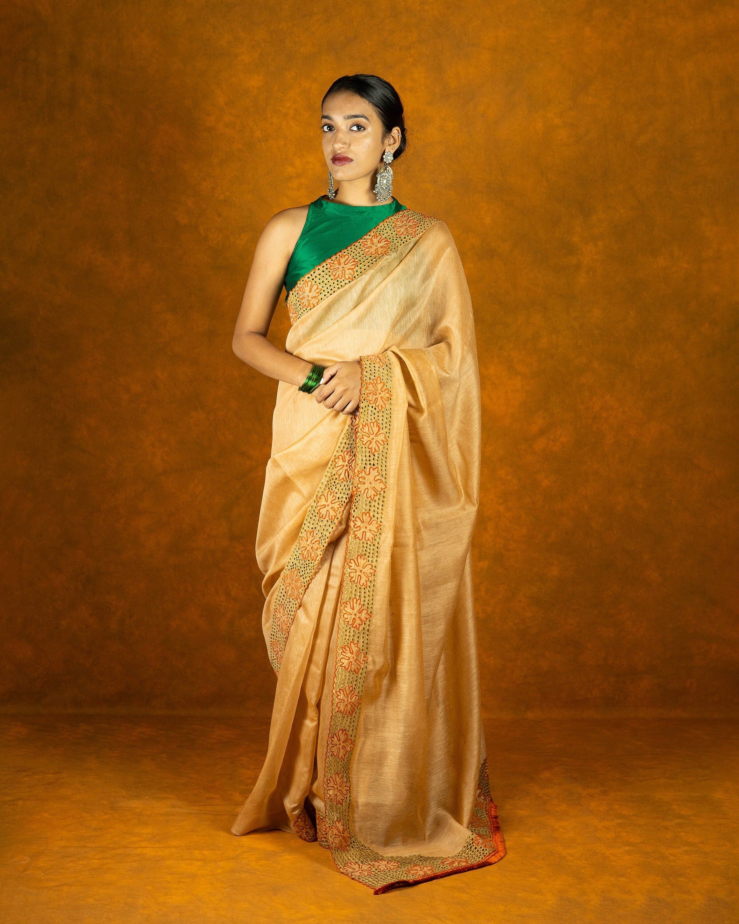 Beige brown cotton cutwork embroidery saree