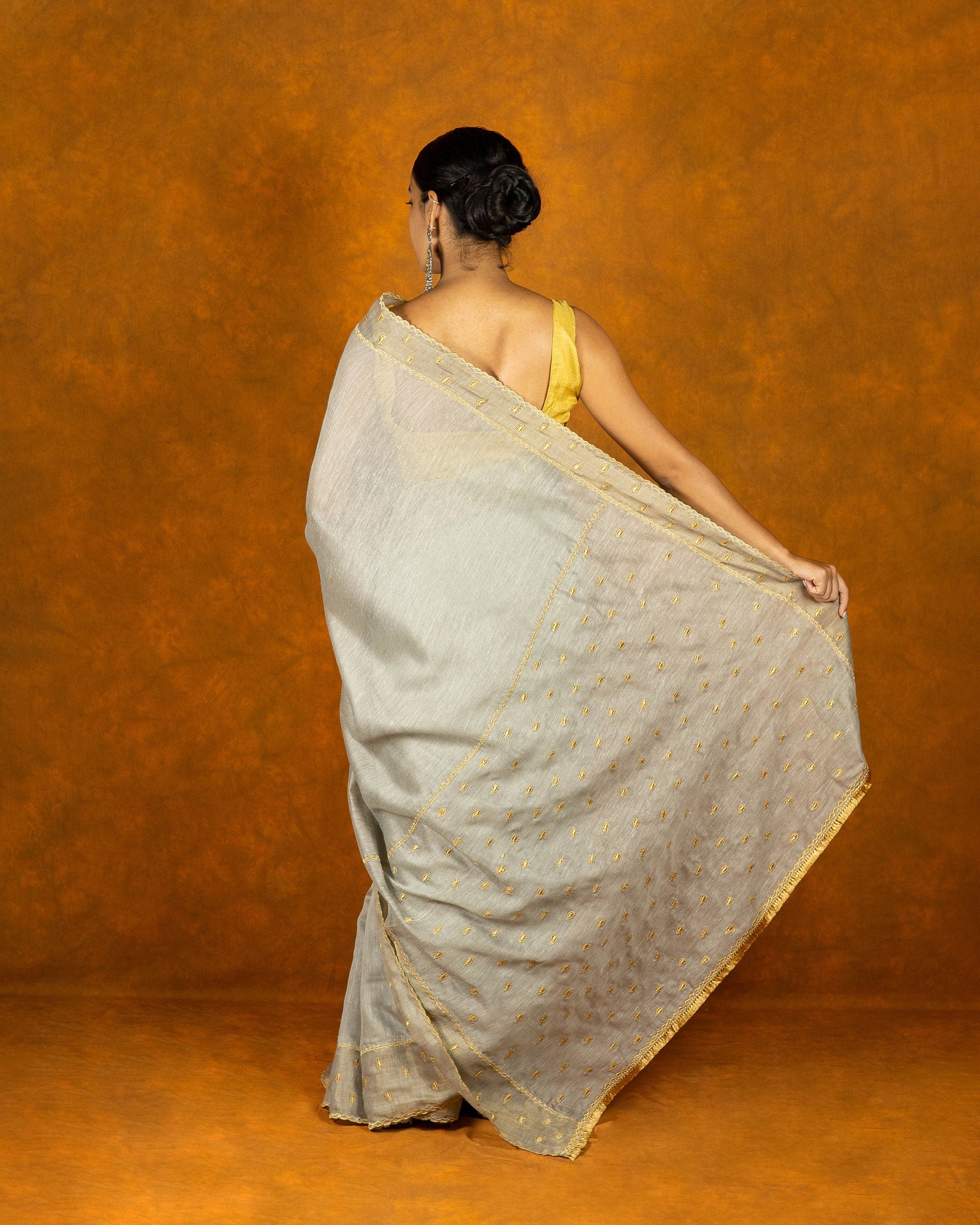 Gray cotton embroidery saree with gold work borde
