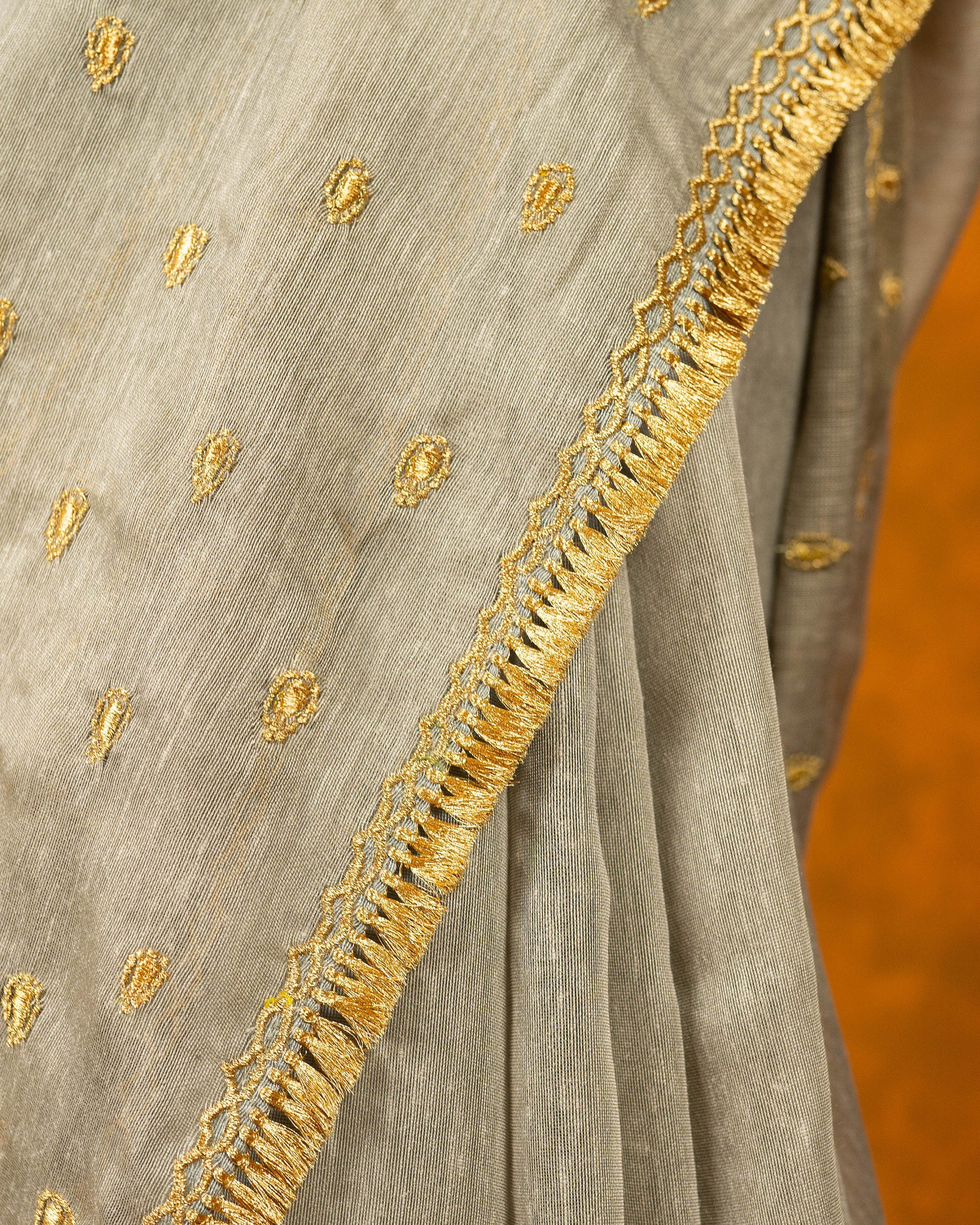 Gray cotton embroidery saree with gold work borde
