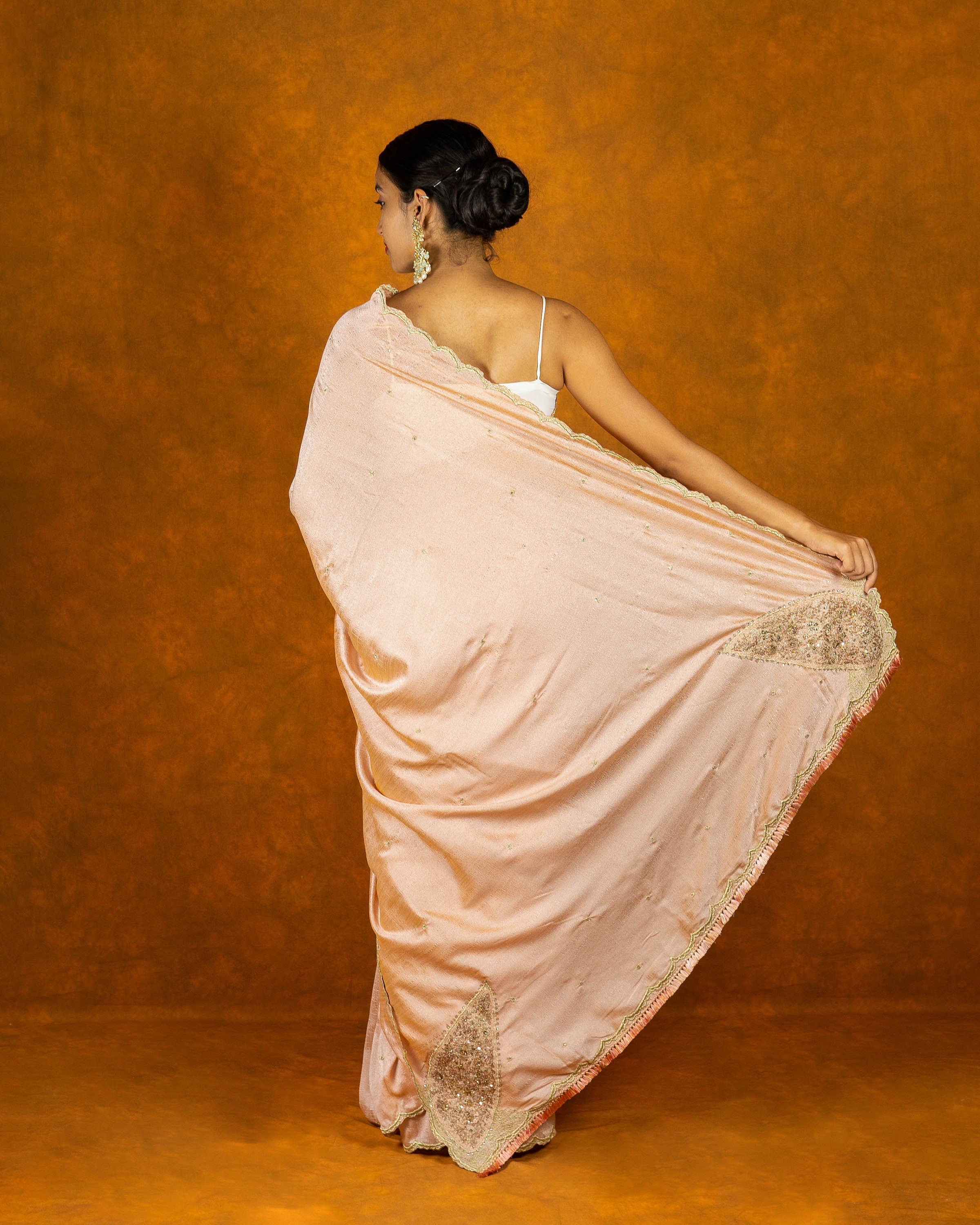 Peach chinon silk blend embroidery saree with crystal and butta work border