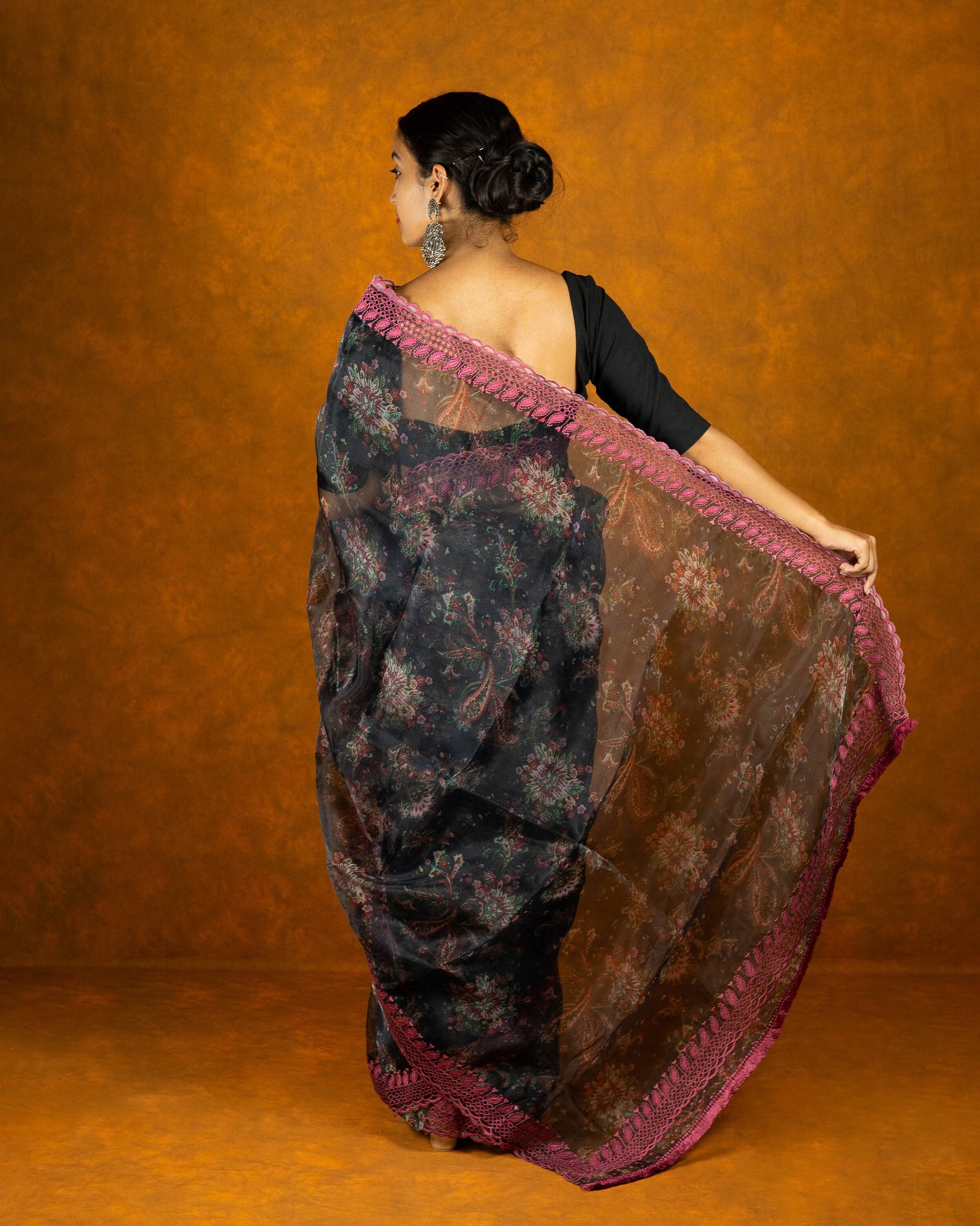Black and pink floral organza saree