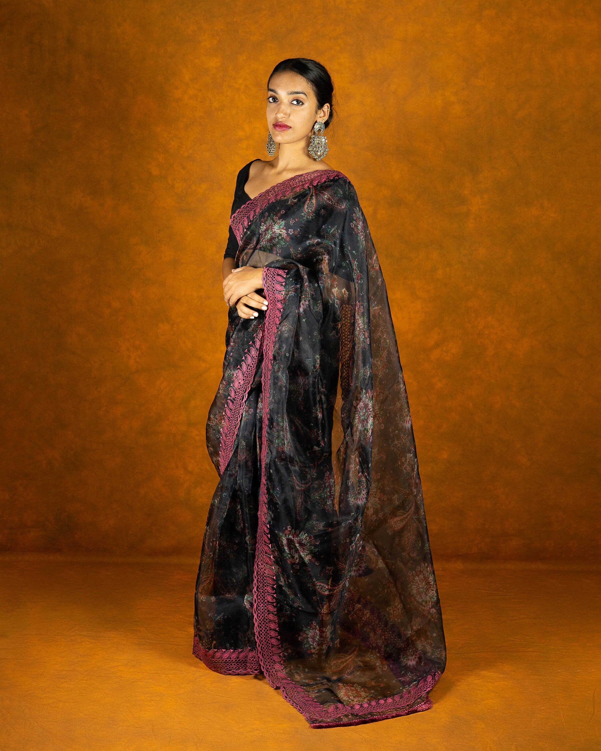Black and pink floral organza saree