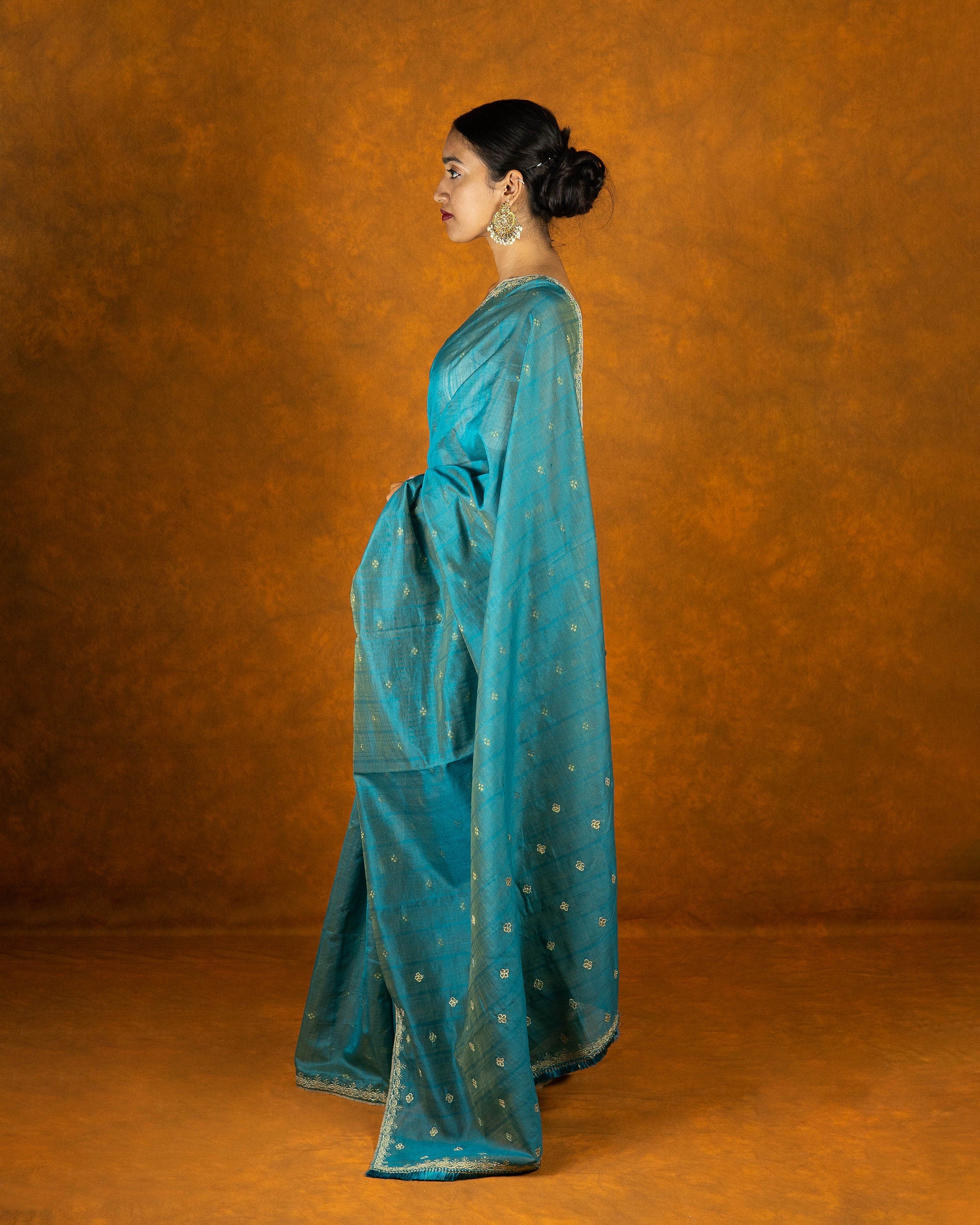 Tiffany blue handloom jute embroidery saree with tassels