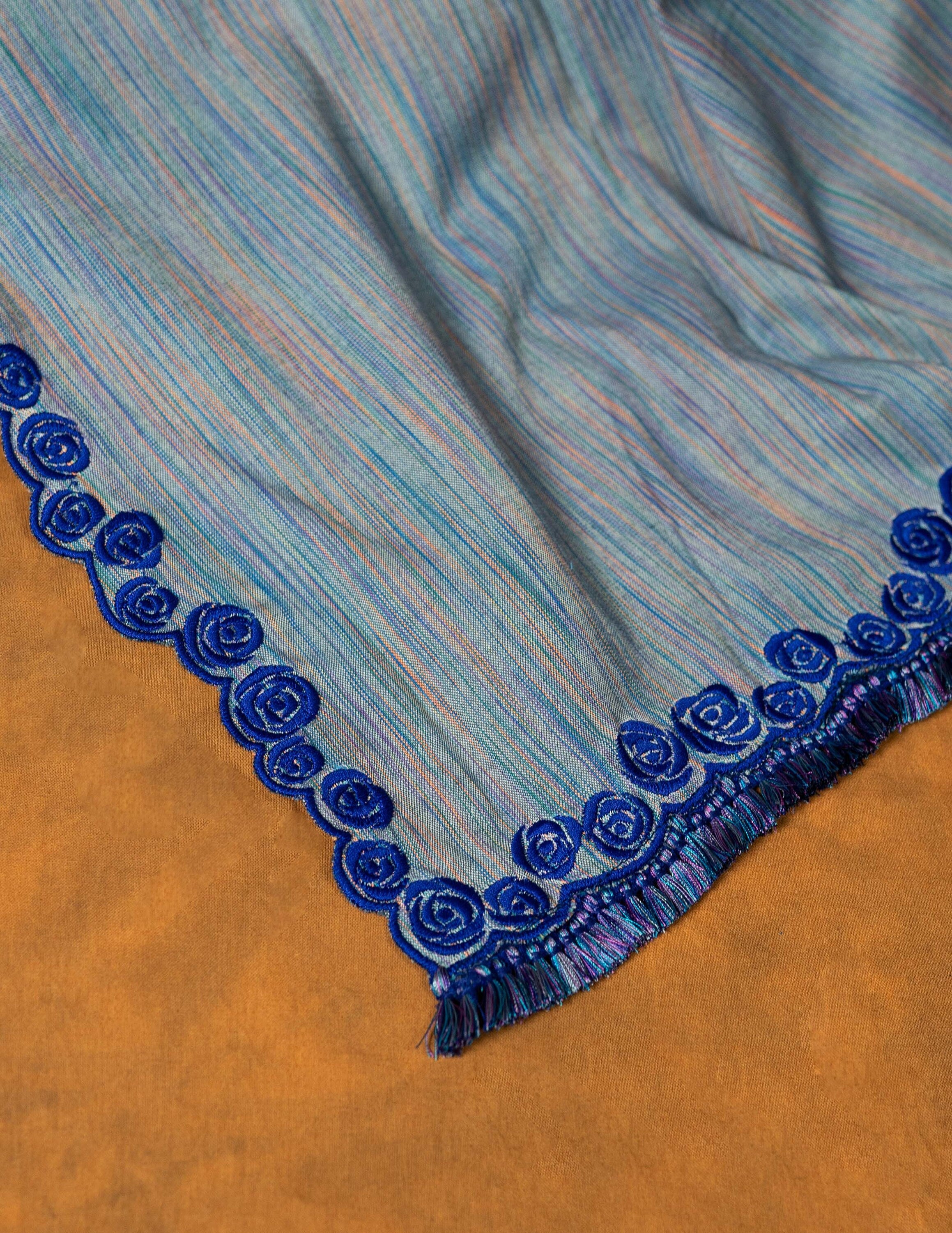 Blue Cotton Linen embroidered saree with tassels
