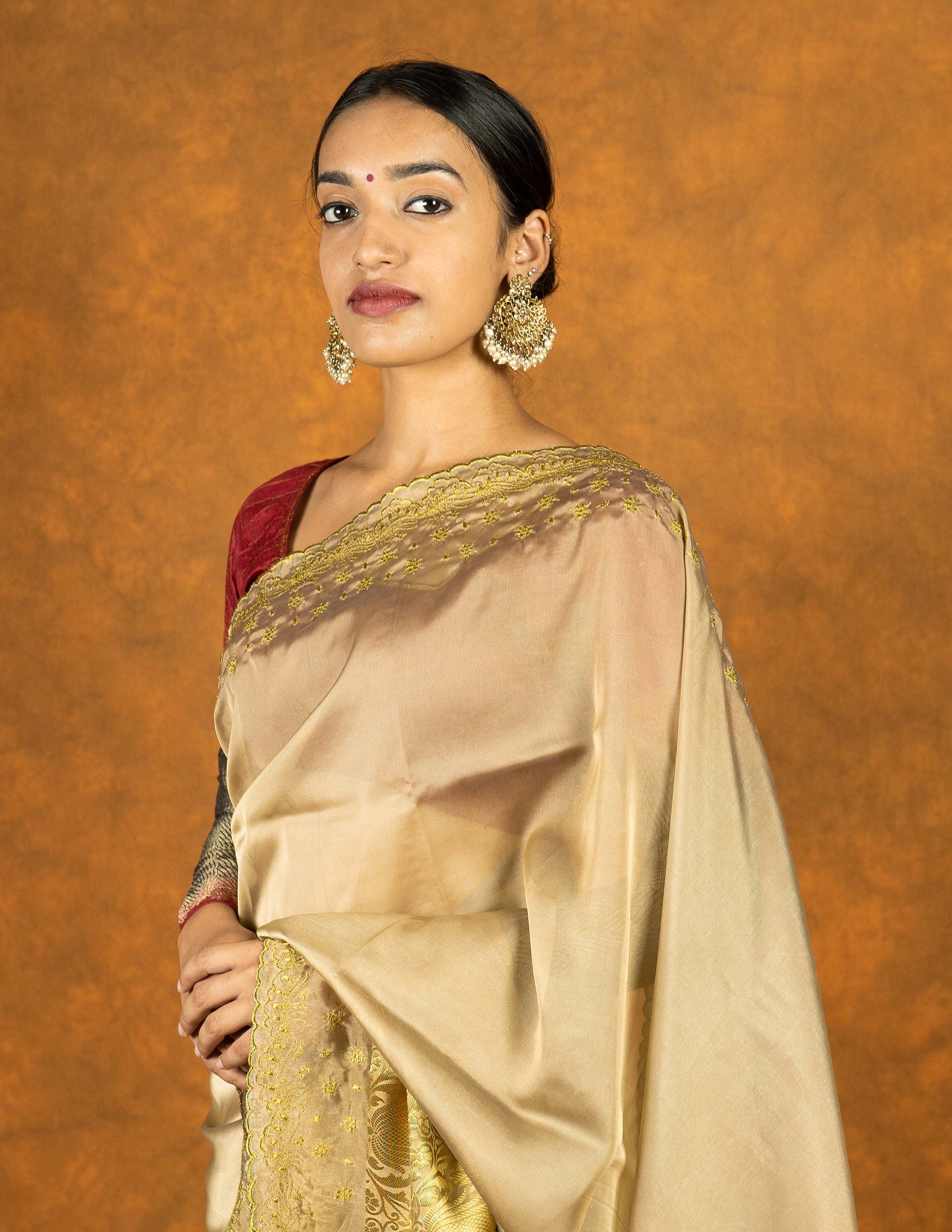 Gold and beige silk embroidered saree scallop and gold tassels