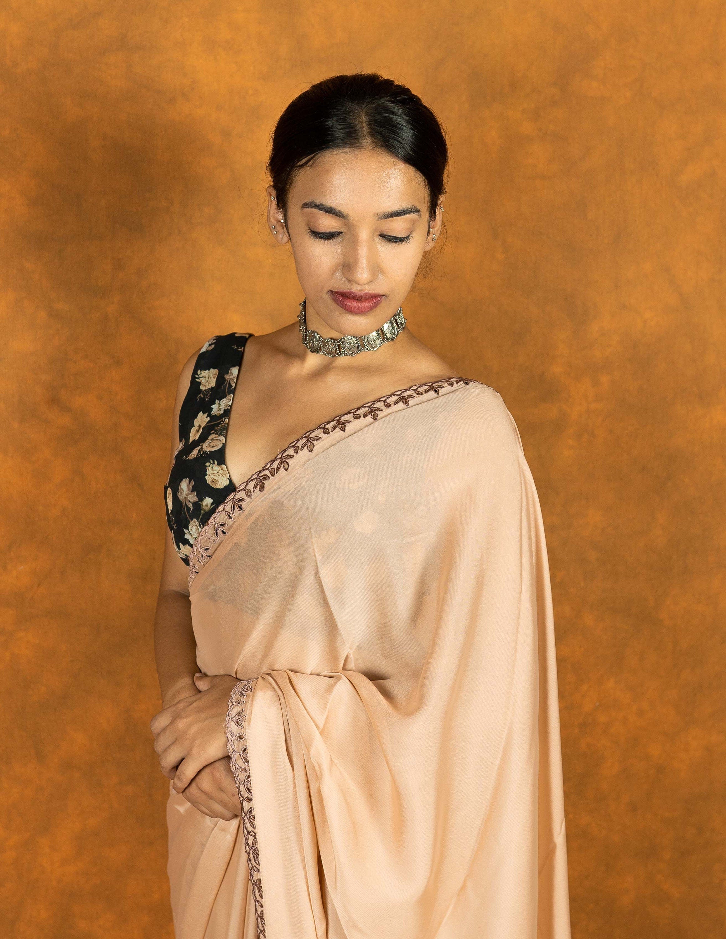 Light brown chiffon embroidered cutwork saree