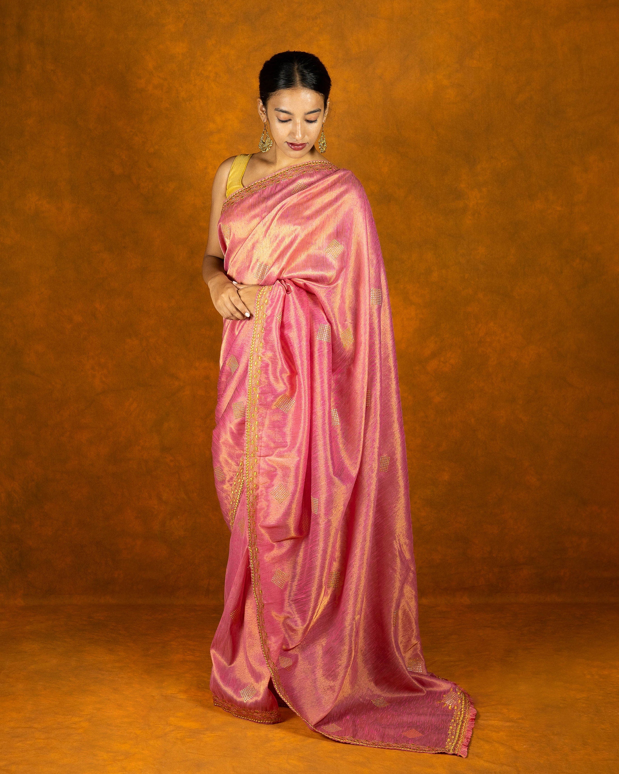 Pink silk blend gold embroidery saree with gold border