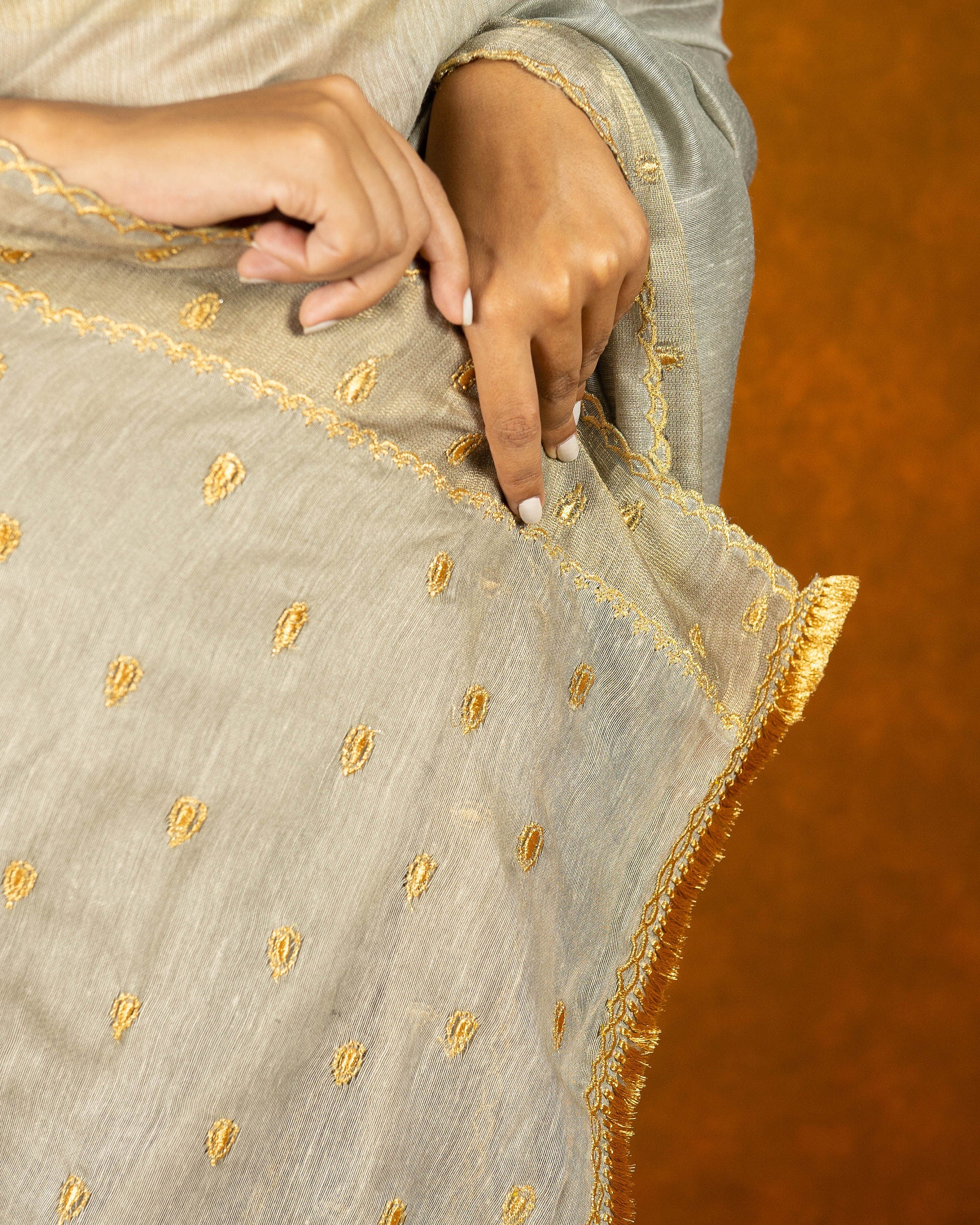 Gray cotton embroidery saree with gold work borde