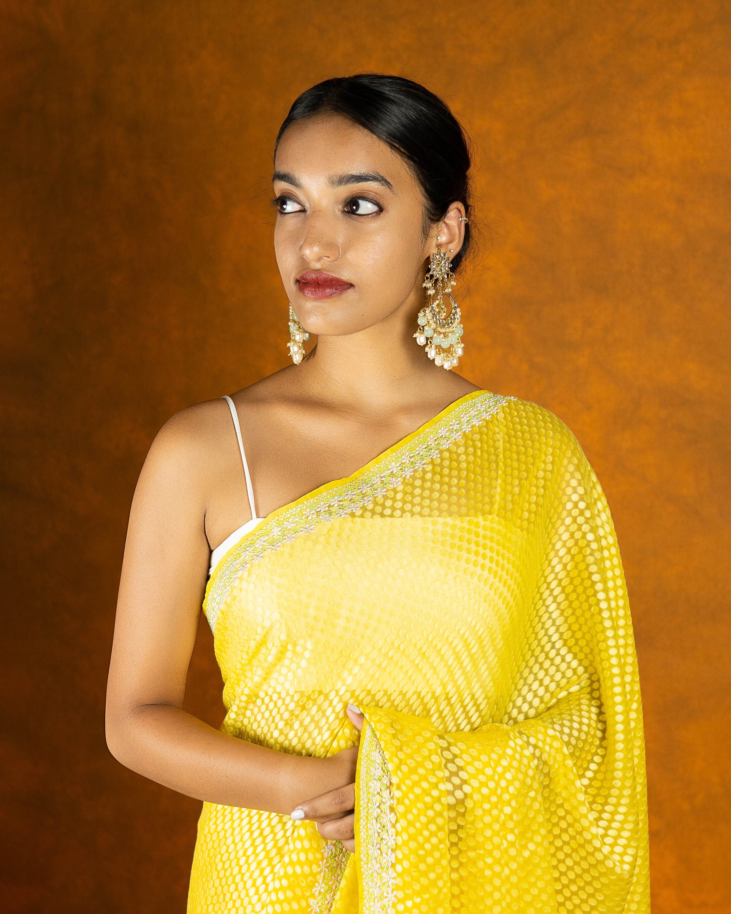 Yellow brasso embroidery saree, festive designer saree