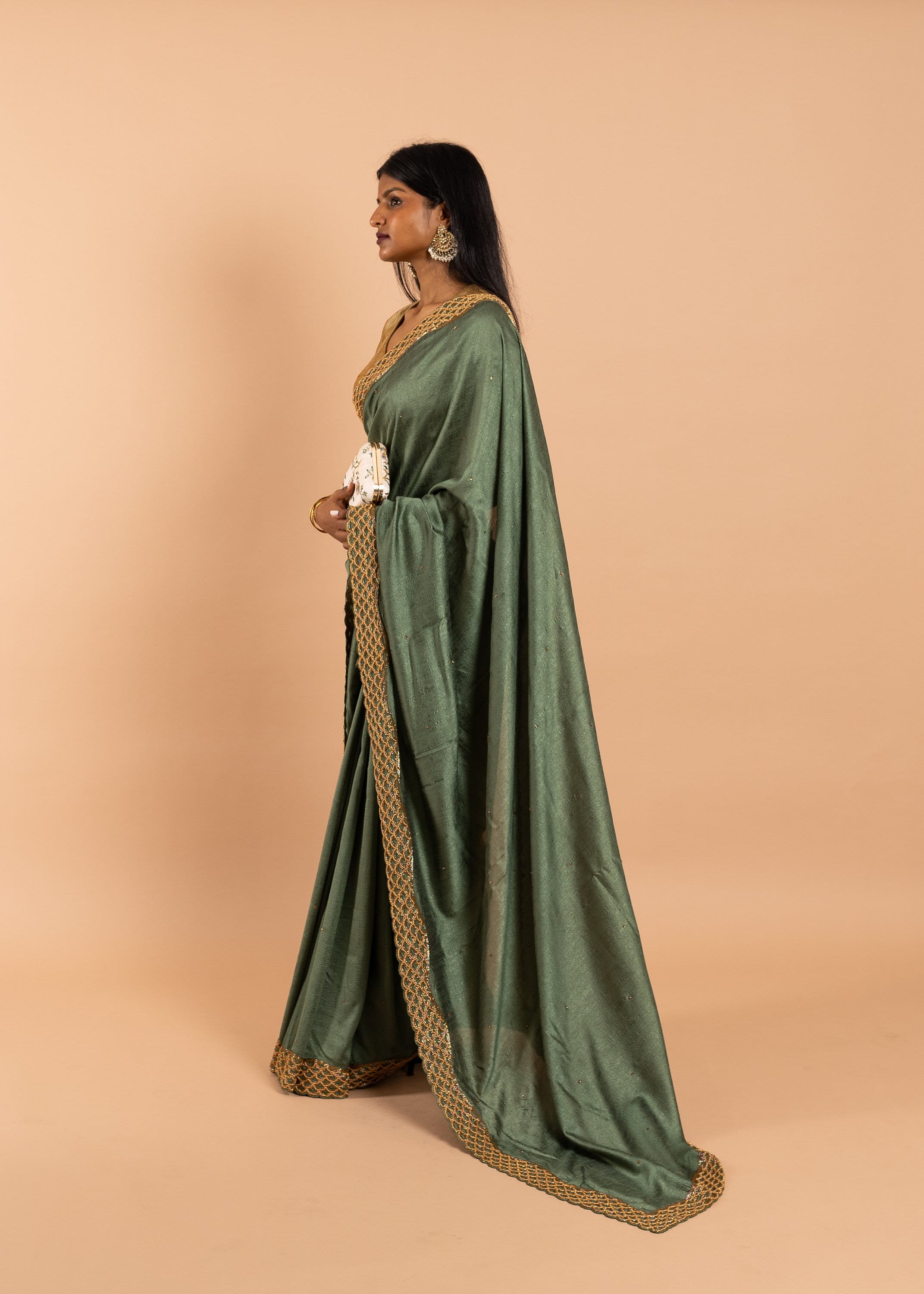 Green silk blend gold link chain handwork saree with gold work border and festive designer saree