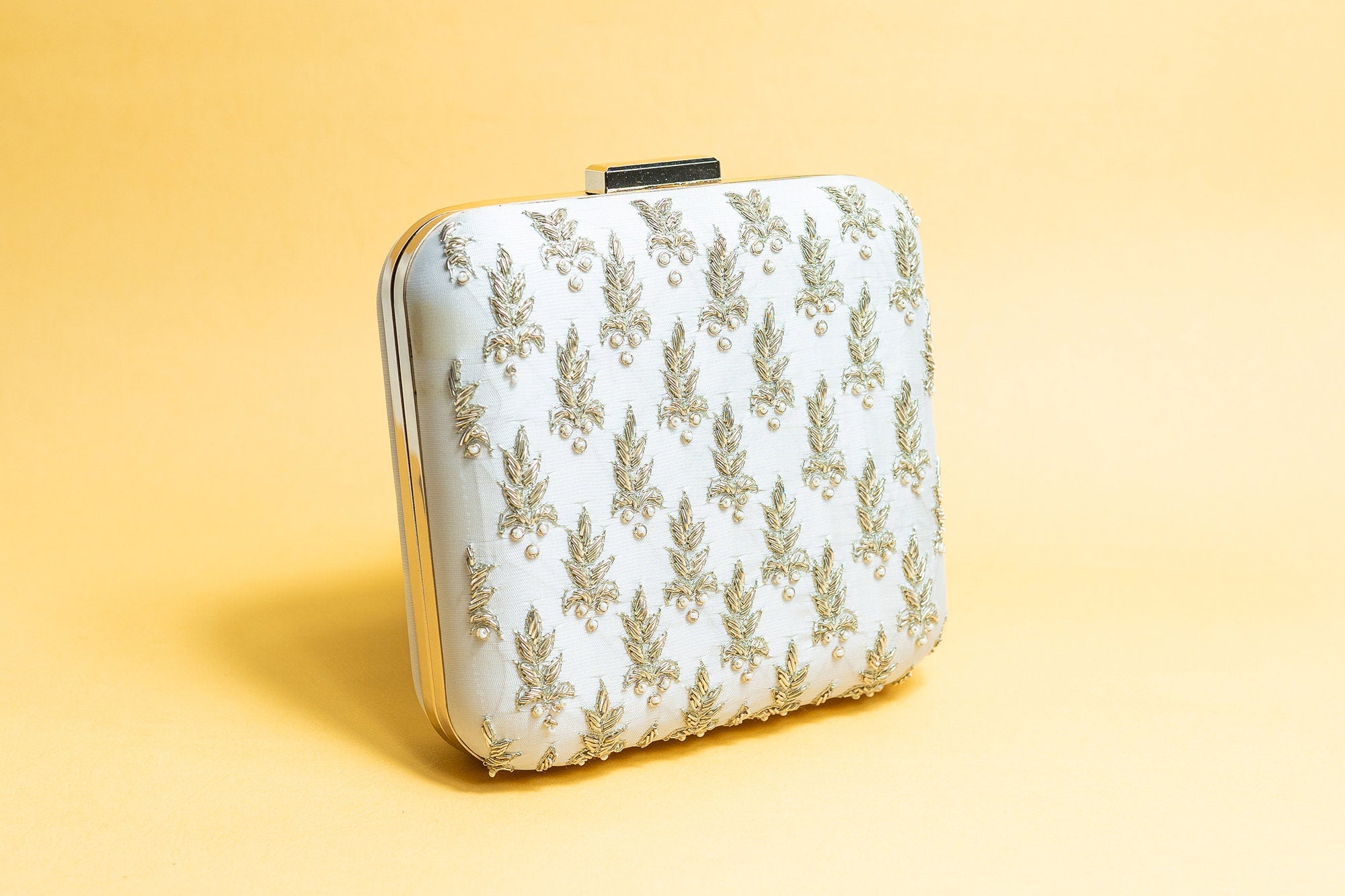 Ivory and gold clutch bag sale