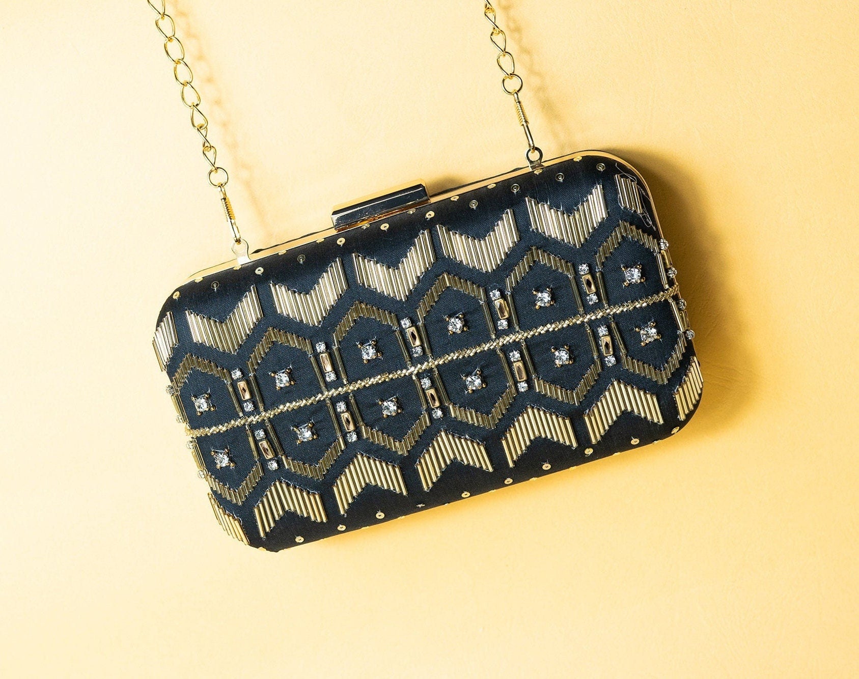 Black and Gold silk clutch purse/bag with detachable metal sling