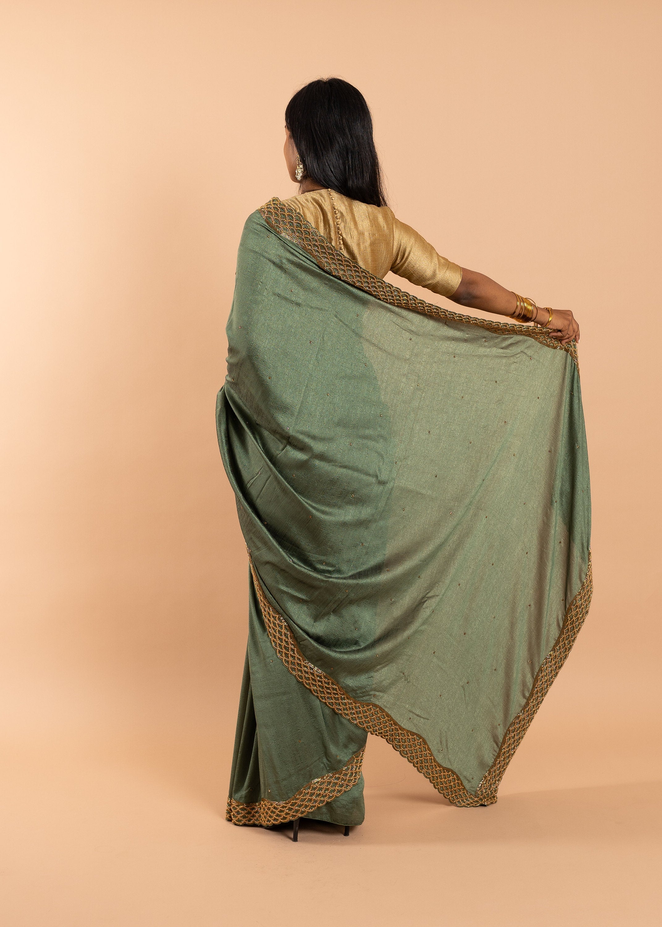 Green silk blend gold link chain handwork saree with gold work border and festive designer saree