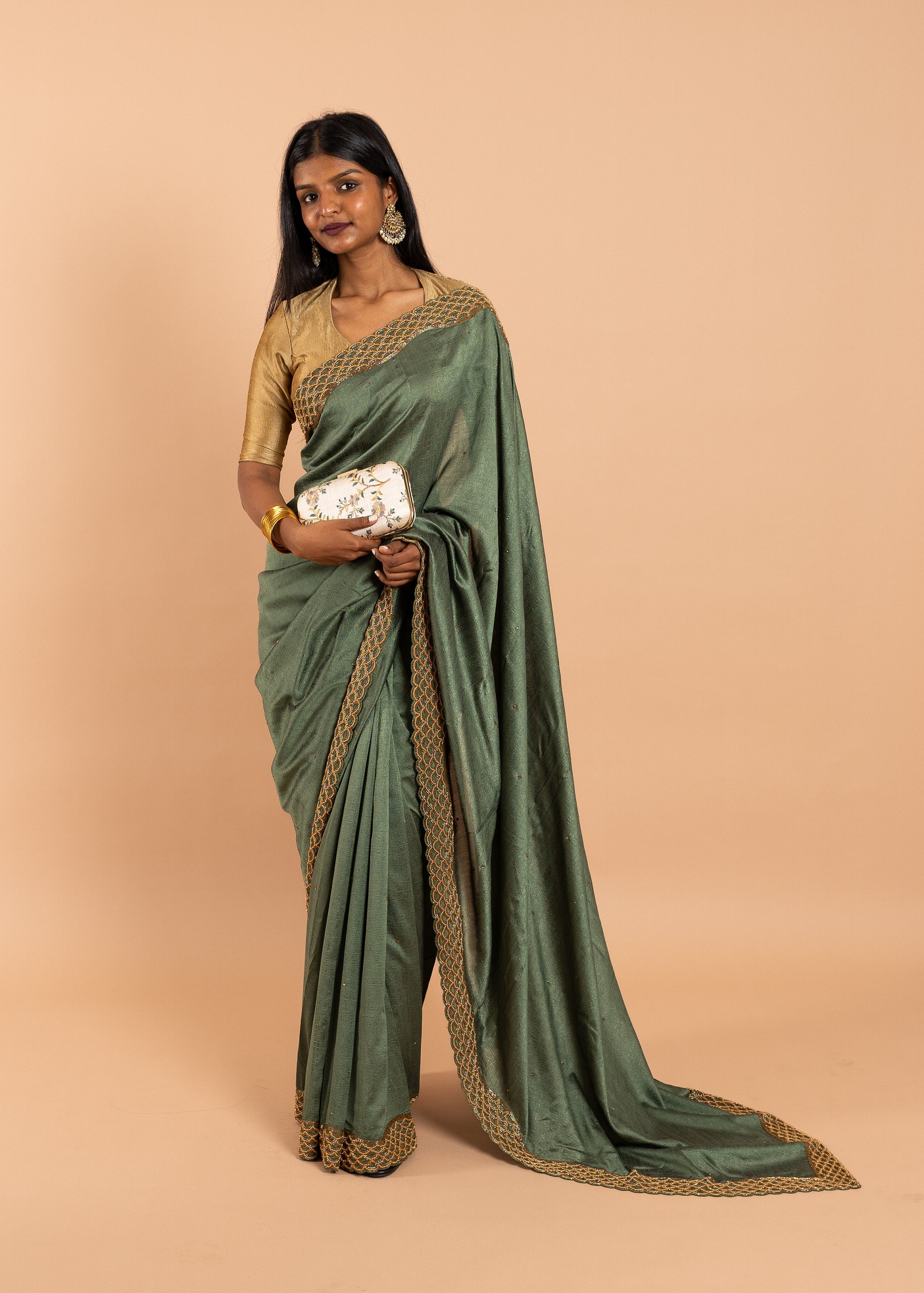 Green silk blend gold link chain handwork saree with gold work border and festive designer saree
