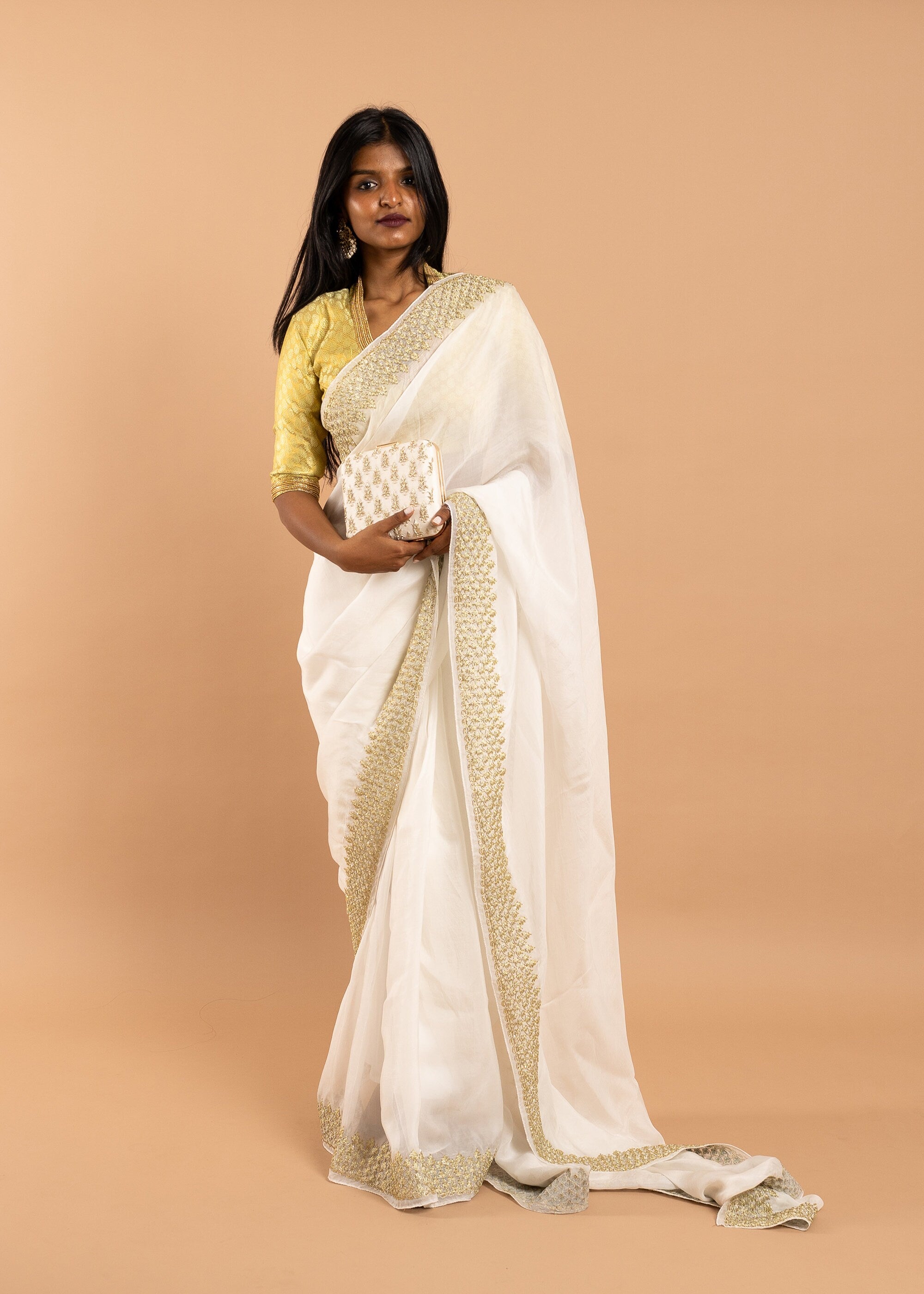 White/ivory organza saree with silk thread and gold wire and beads handwork embroidery