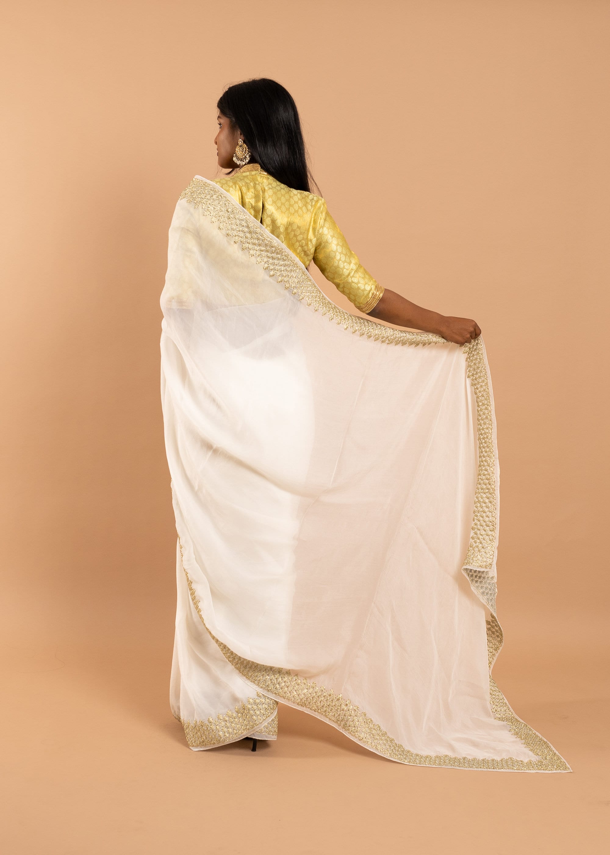 White/ivory organza saree with silk thread and gold wire and beads handwork embroidery