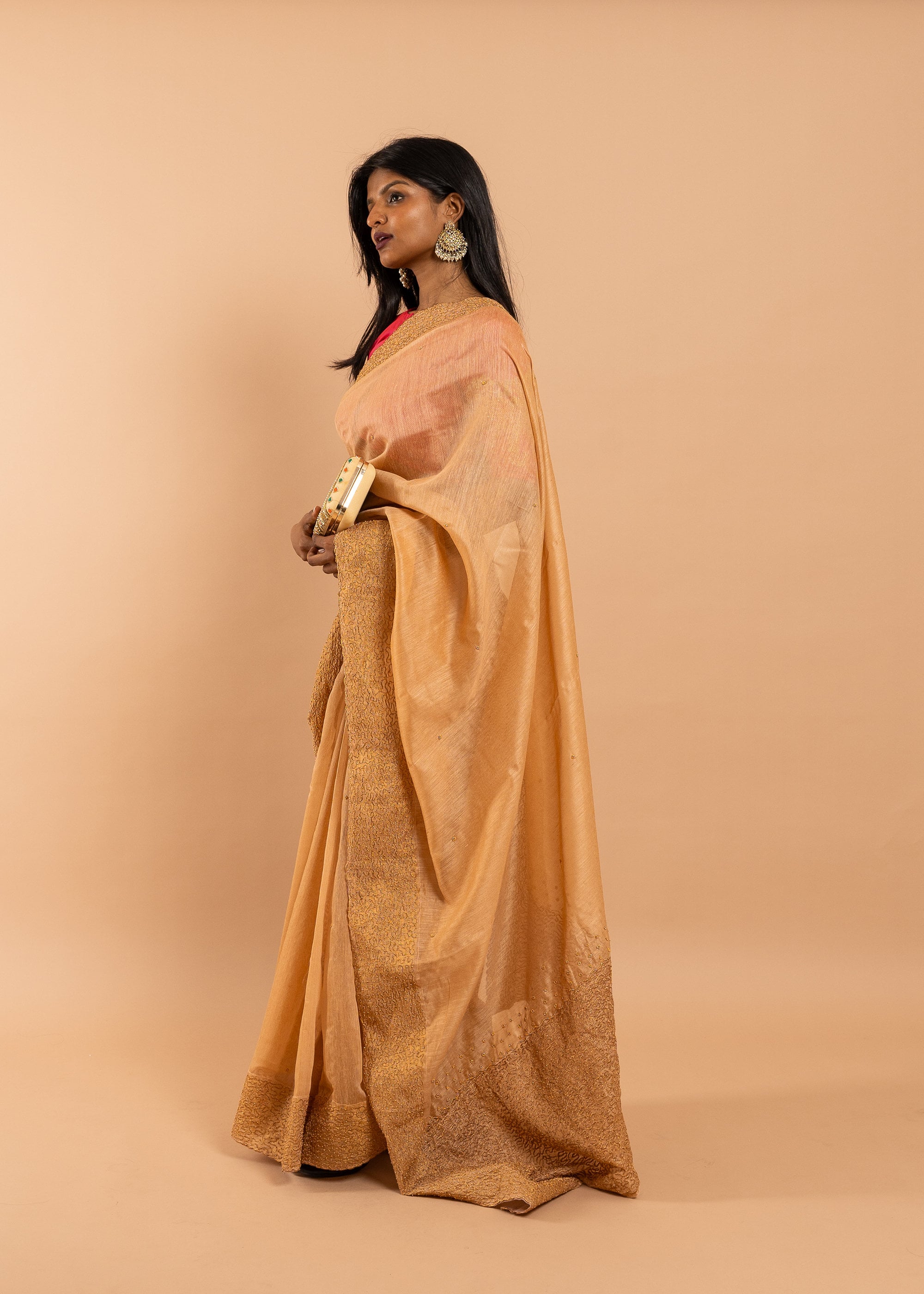 Antique gold saree with silk thread handwork and beads embroidery