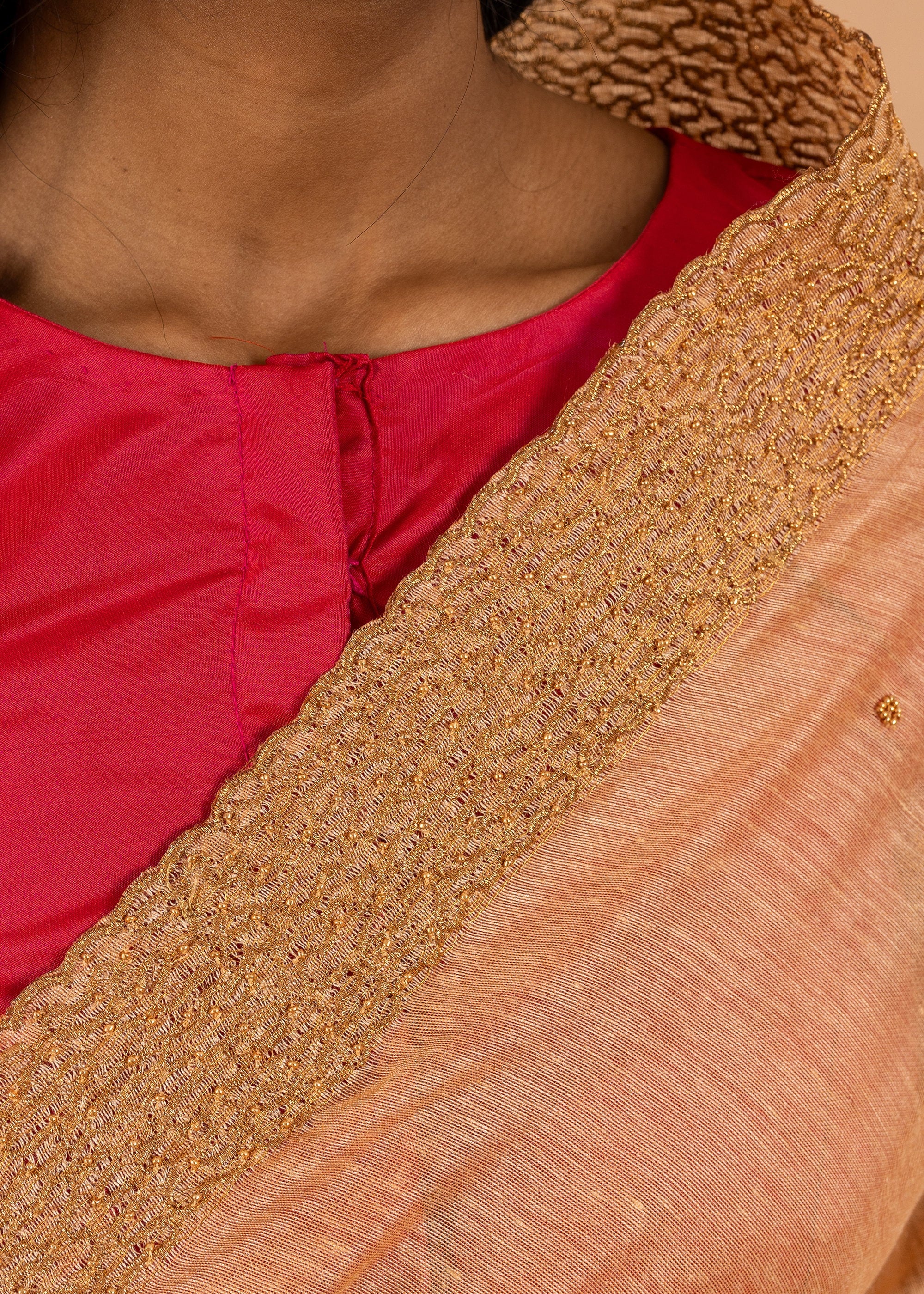 Antique gold saree with silk thread handwork and beads embroidery