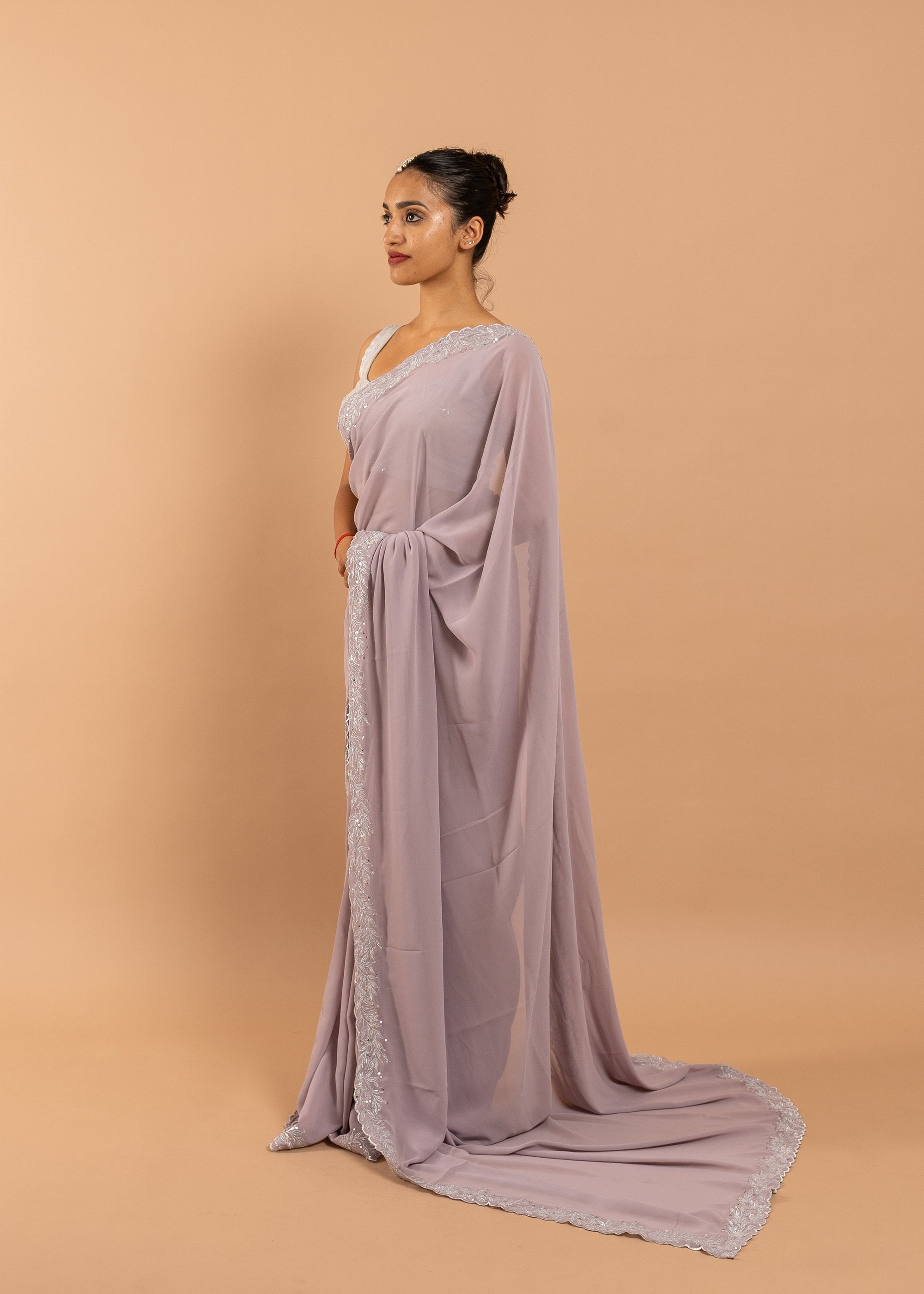 Lavender Georgette saree with silk thread and zari handwork and beads embroidery
