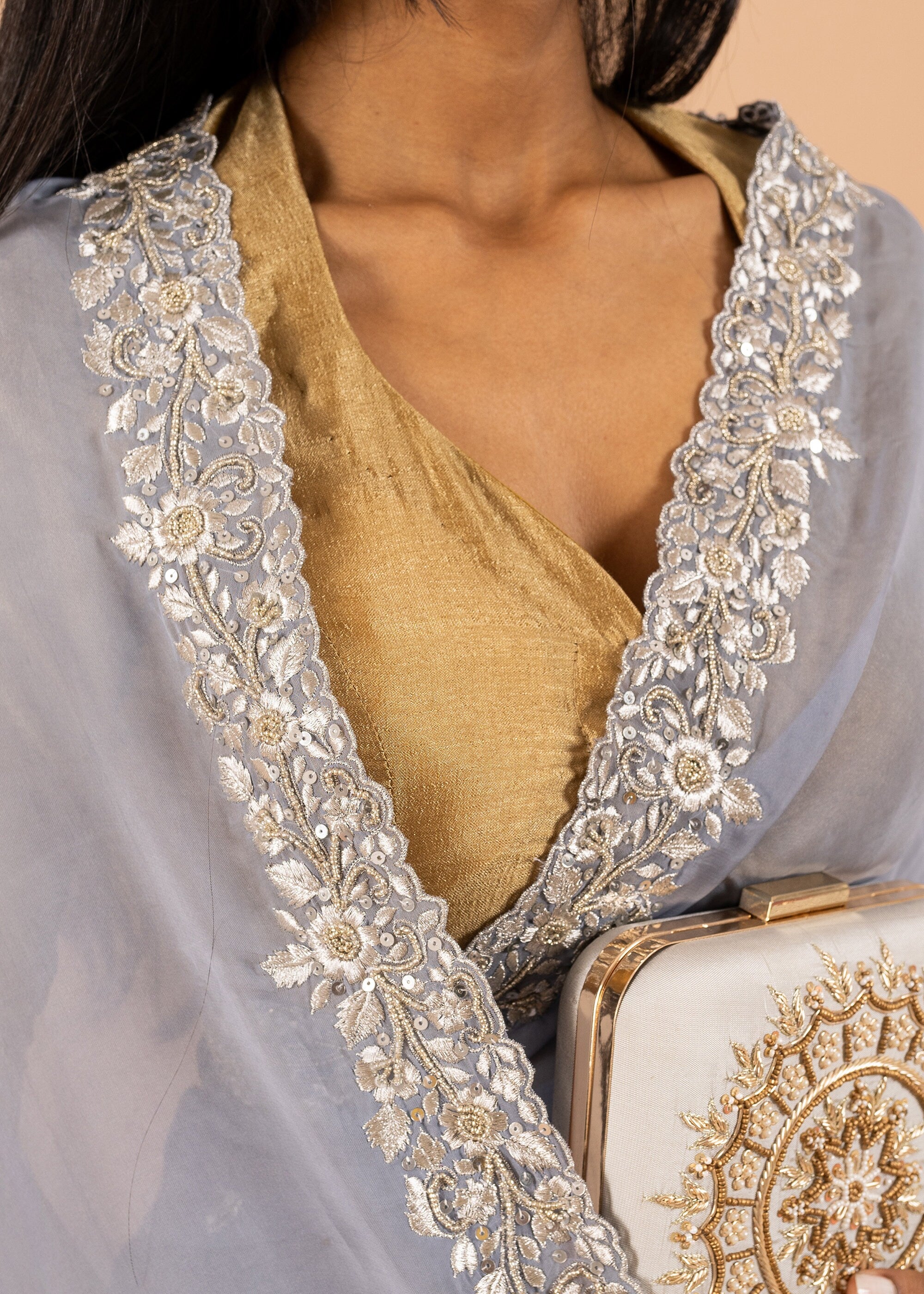 Gray organza saree with zari silk thread and beads handwork embroidery