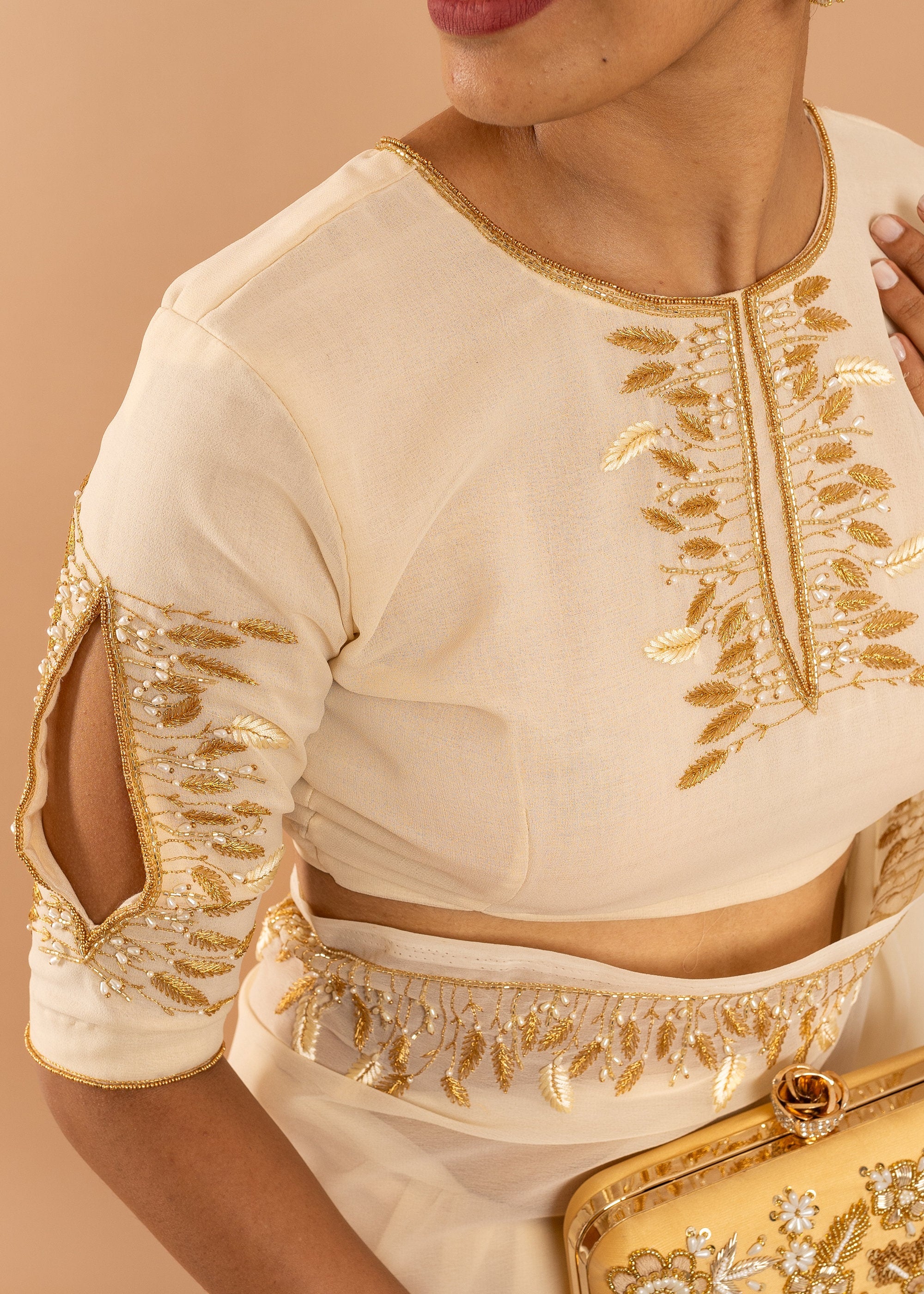 Cream georgette saree with silk thread  and beads handwork embroidery