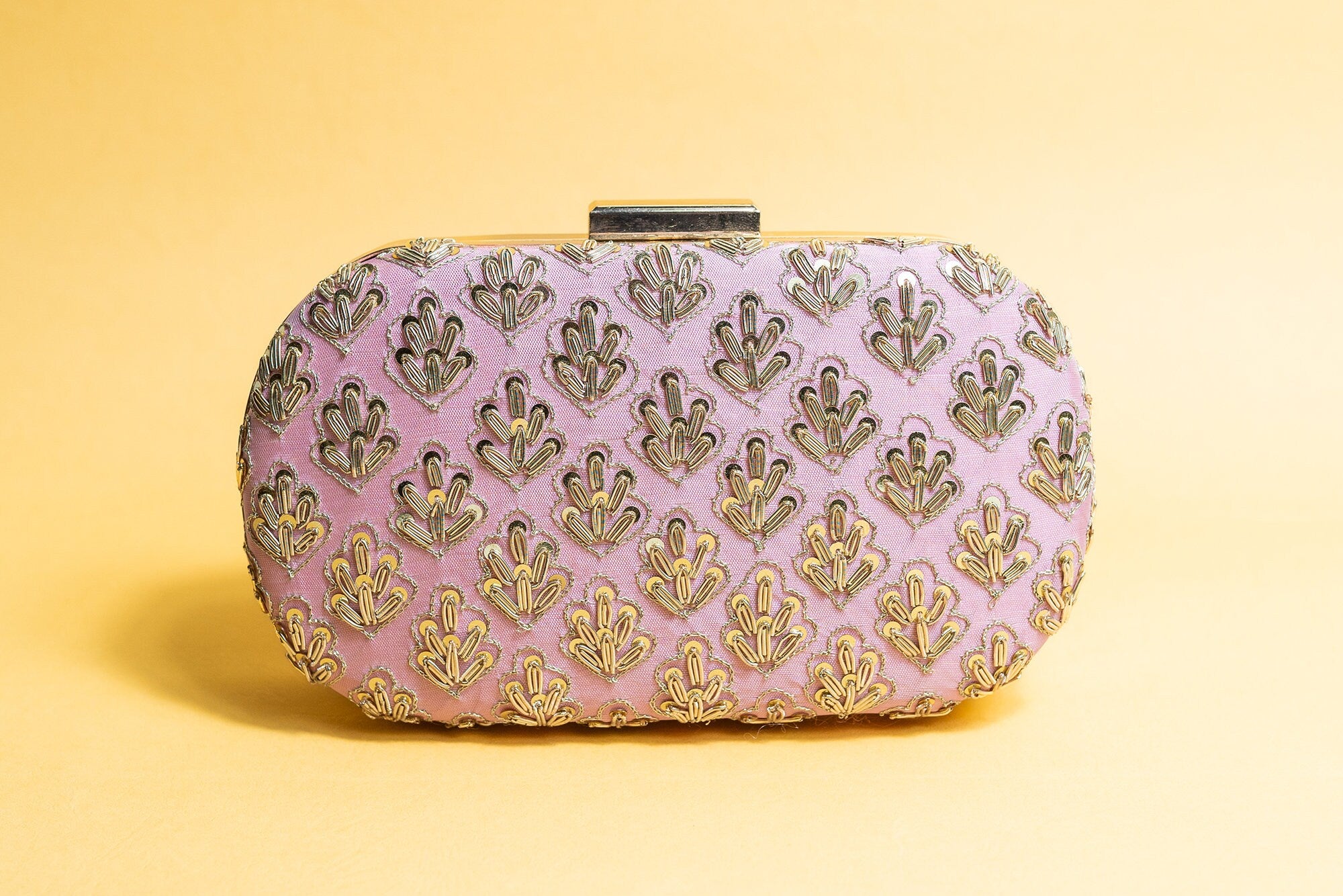 Pink metal embroidery clutch bag with detachable sling
