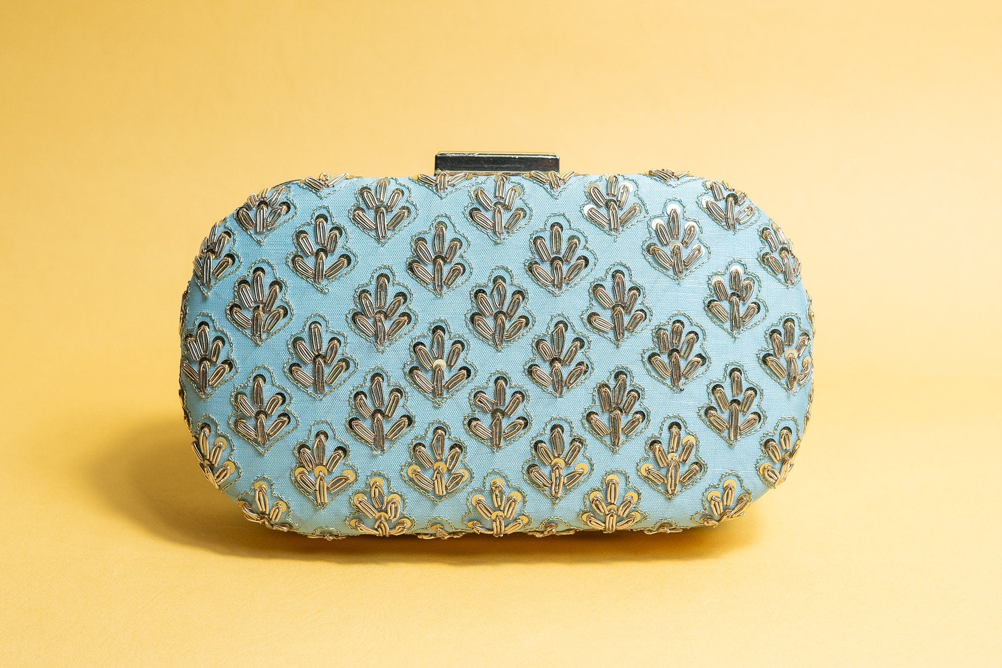 Powder blue metal embroidery clutch bag with detachable sling
