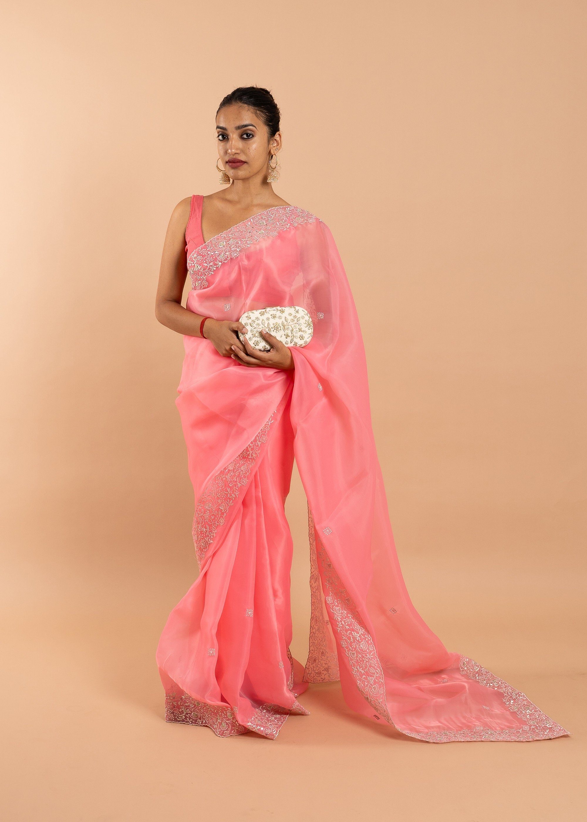 Pink and silver handwork embroidery organza saree with zari work border