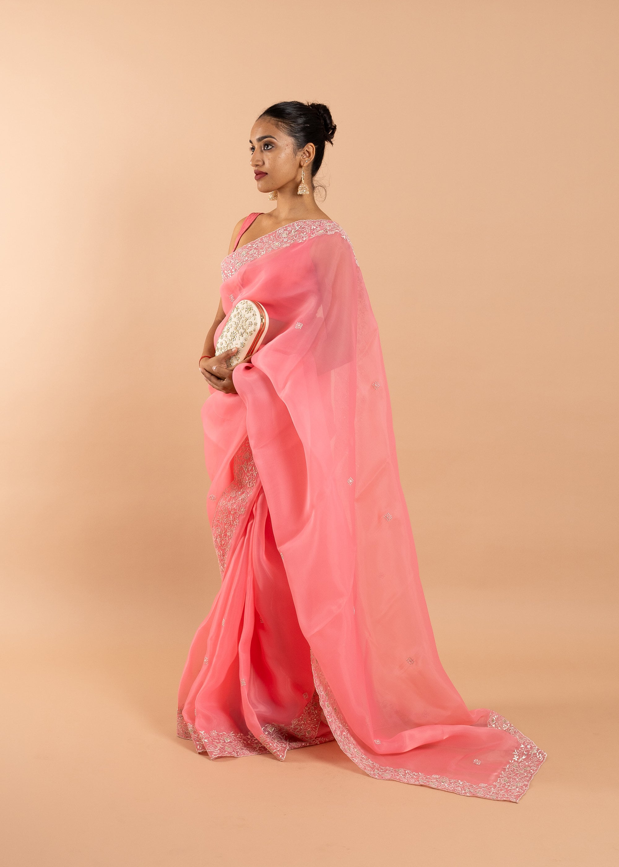 Pink and silver handwork embroidery organza saree with zari work border