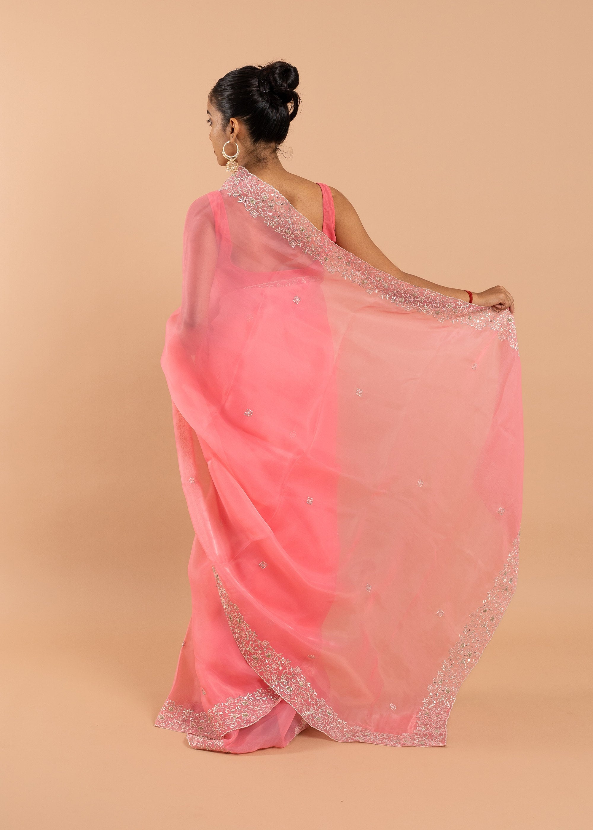 Pink and silver handwork embroidery organza saree with zari work border