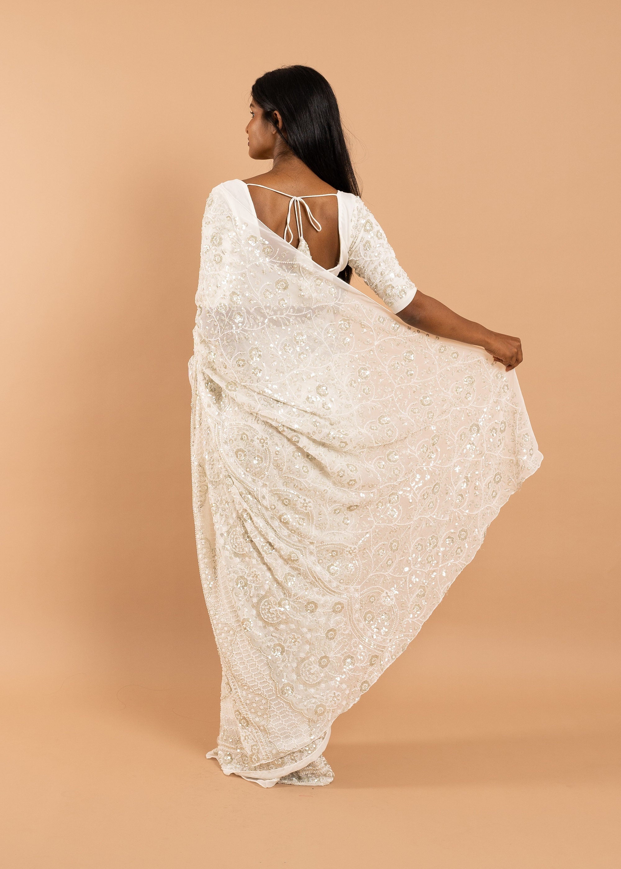 Ivory Georgette saree with white silk thread and sequins handwork embroidery