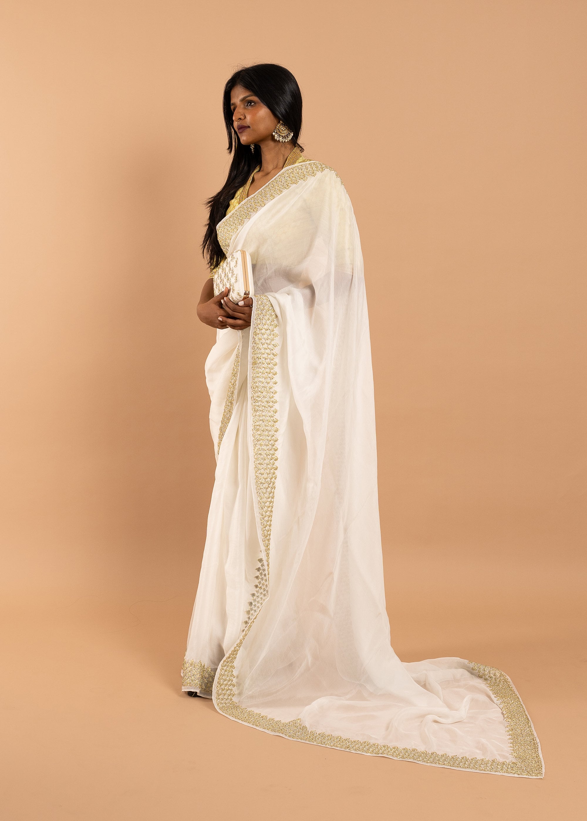 White/ivory organza saree with silk thread and gold wire and beads handwork embroidery