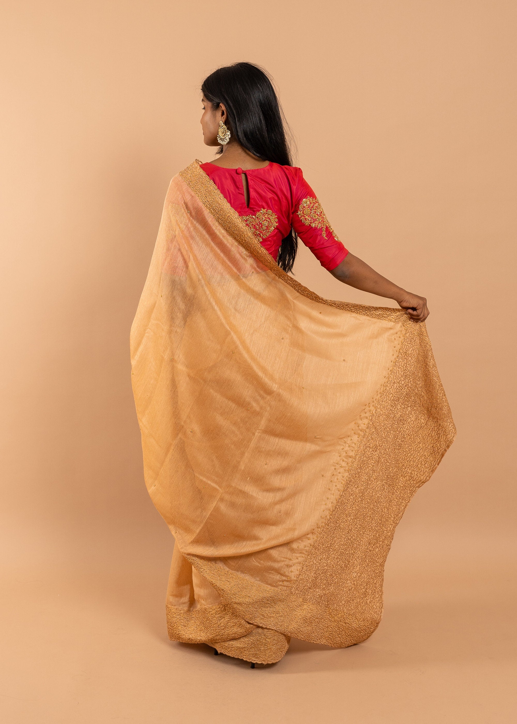 Antique gold saree with silk thread handwork and beads embroidery