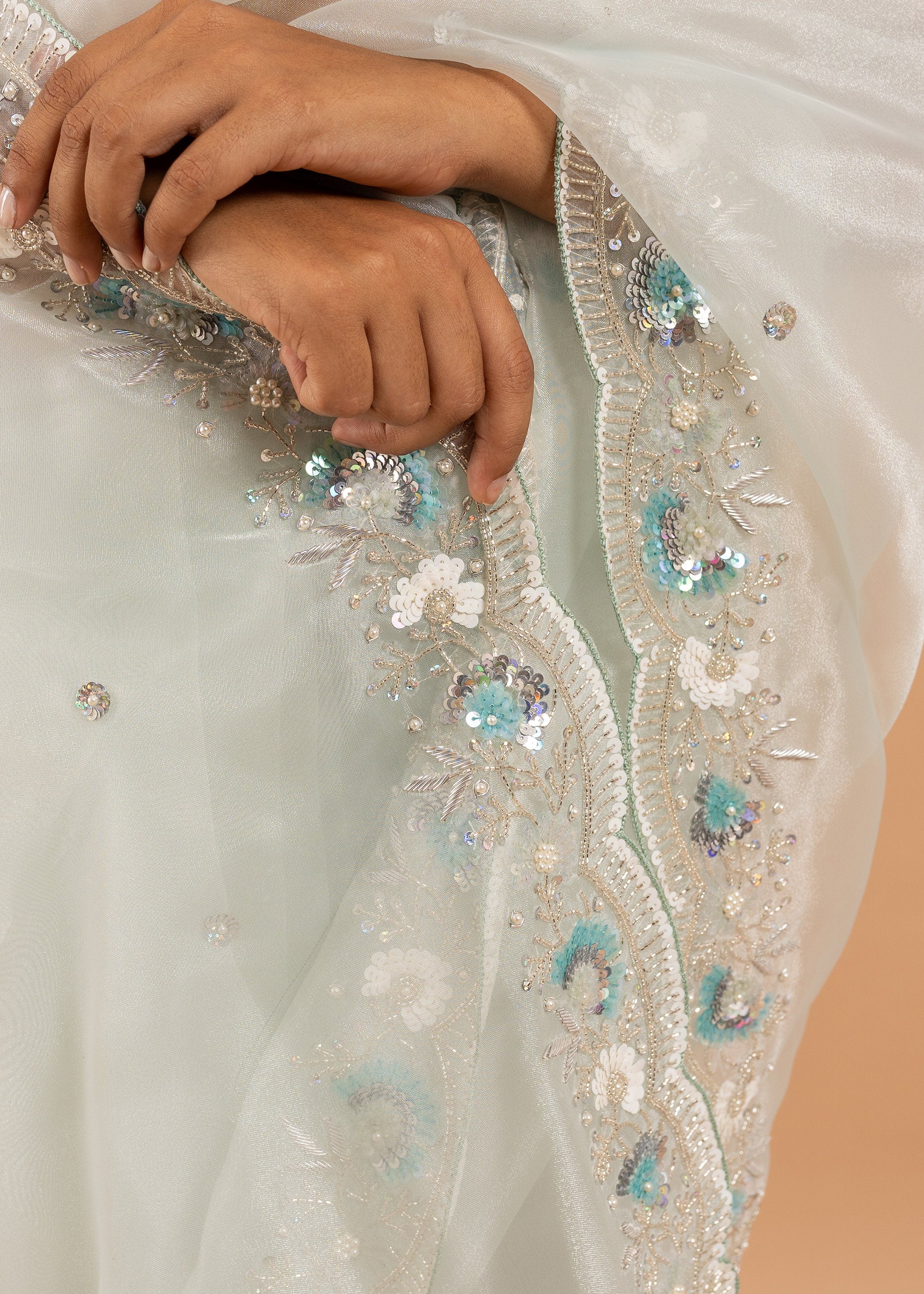 Organza saree with silk thread and sequins handwork and beads embroidery