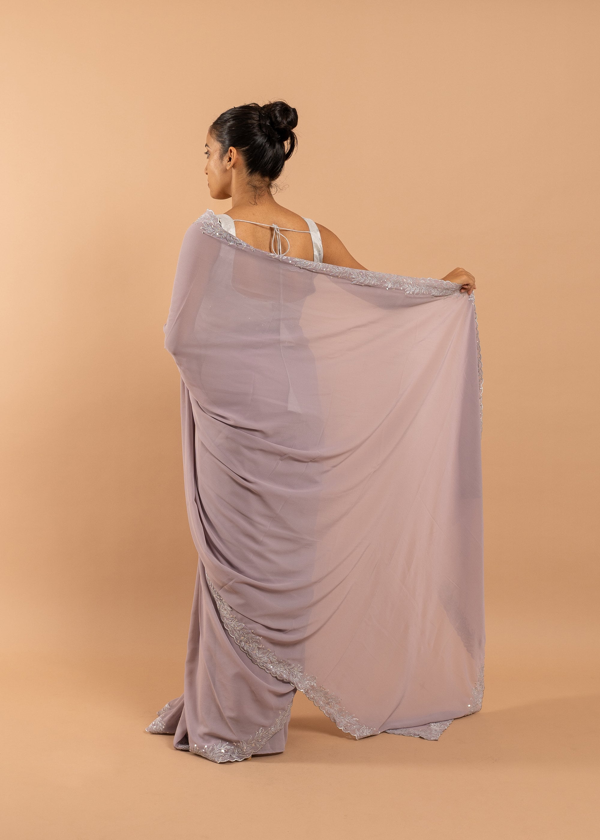 Lavender Georgette saree with silk thread and zari handwork  and beads embroidery