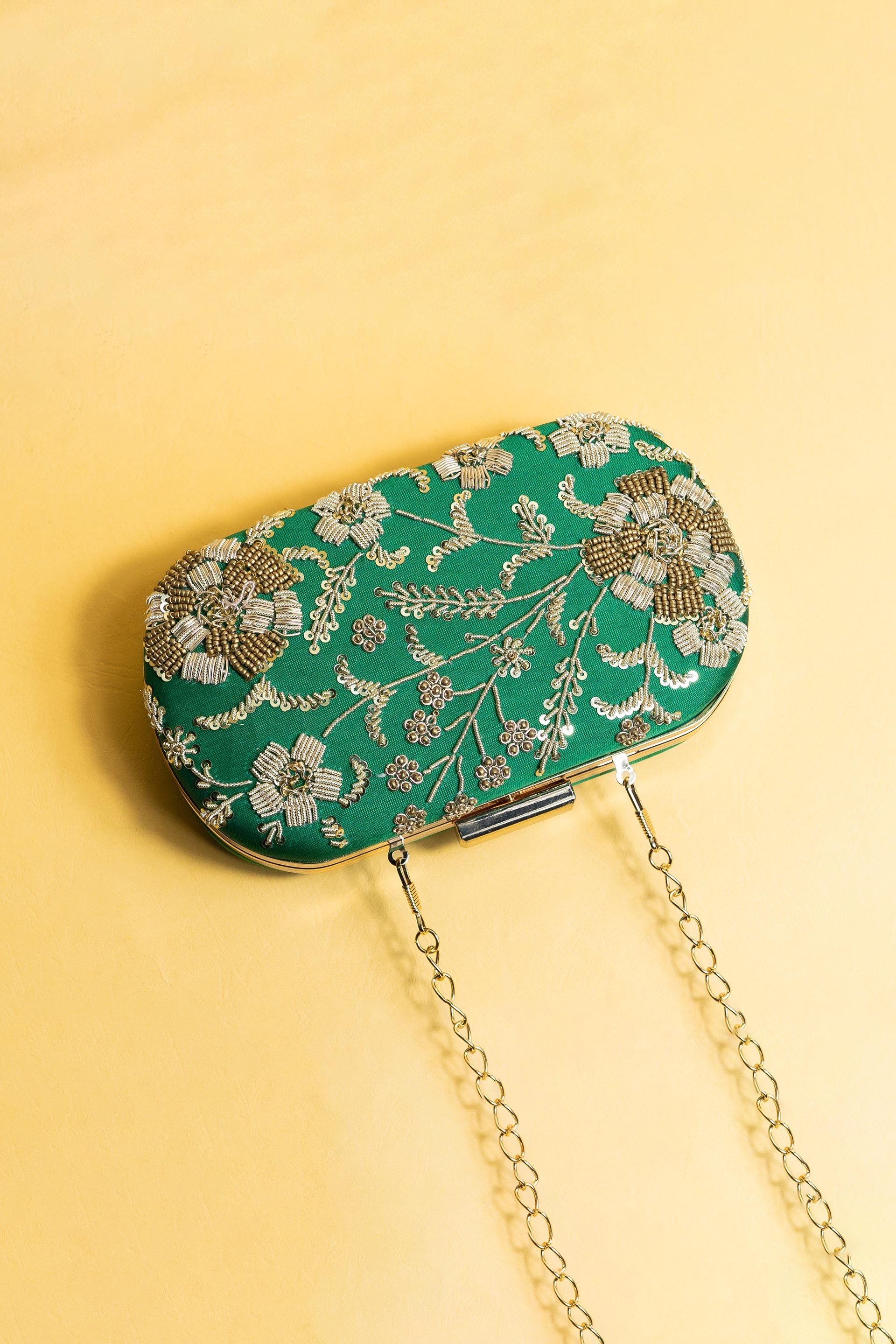 Green bead embroidery clutch bag with detachable sling