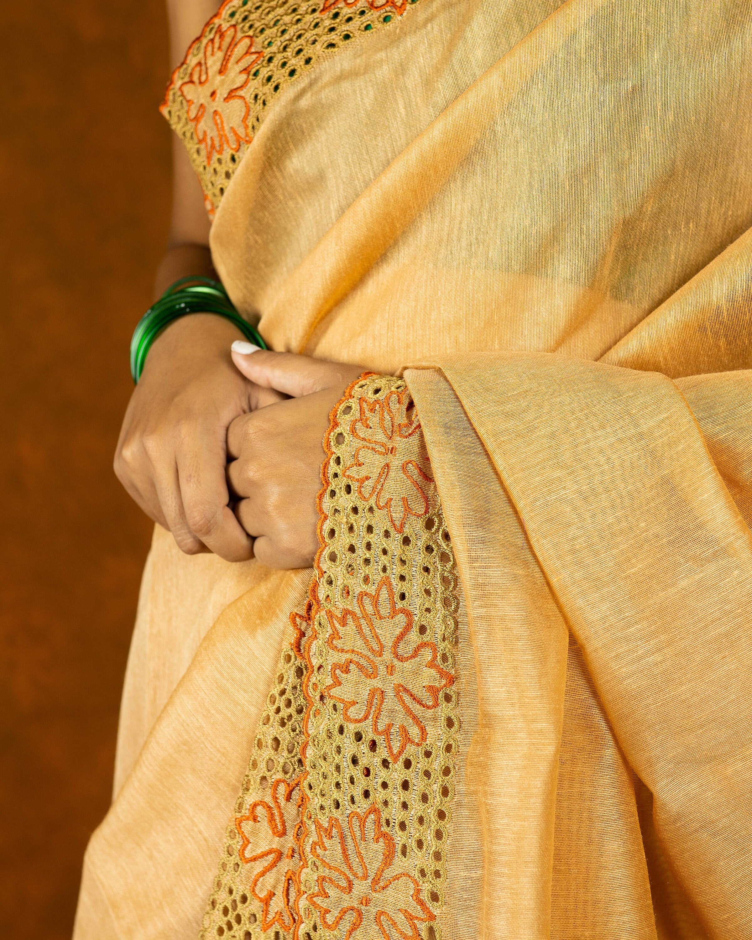 Beige brown cotton cutwork embroidery saree