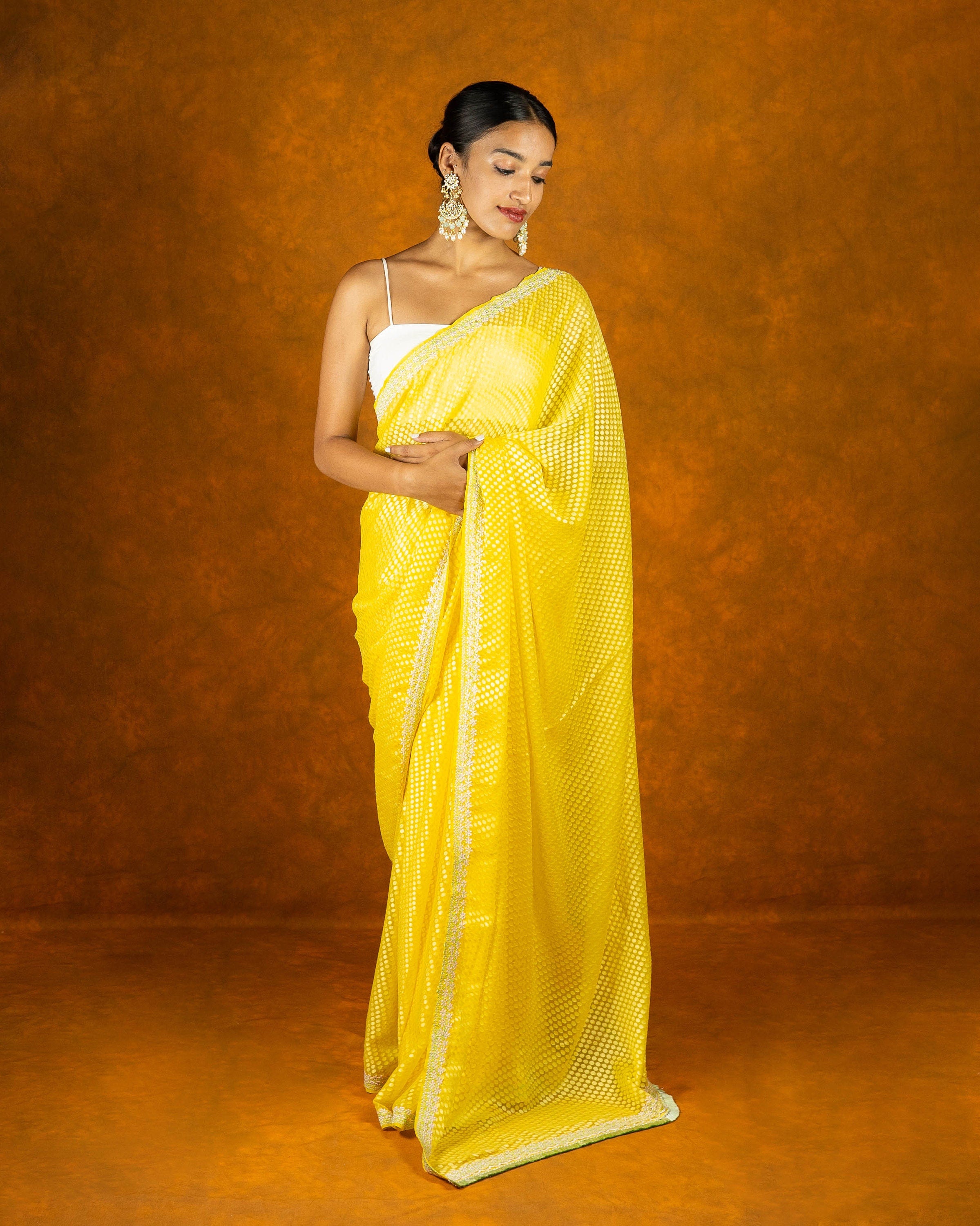 Yellow brasso embroidery saree, festive designer saree
