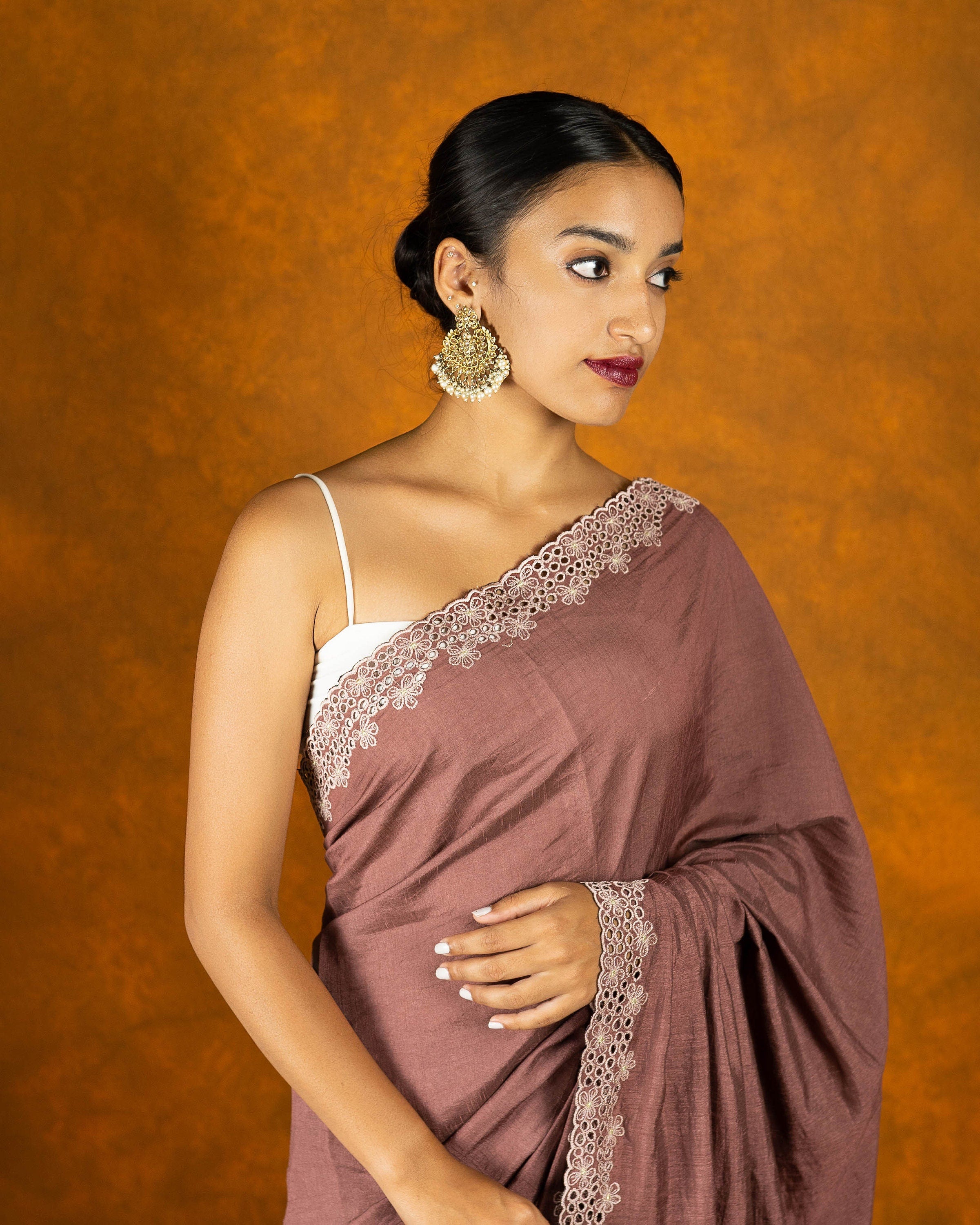 Mauve silk blend saree with silk thread cutwork embroidery