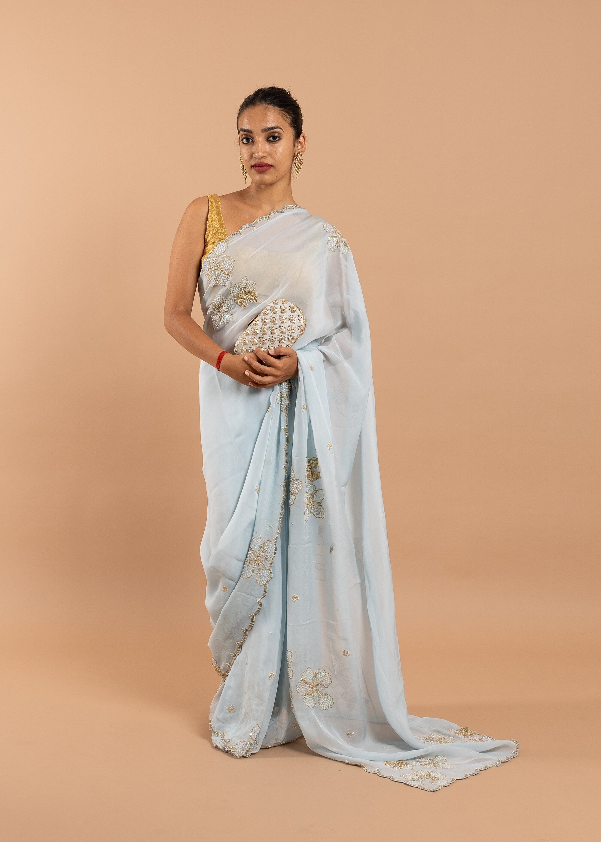Blue organza saree with gold zari silk thread and beads handwork embroidery saree