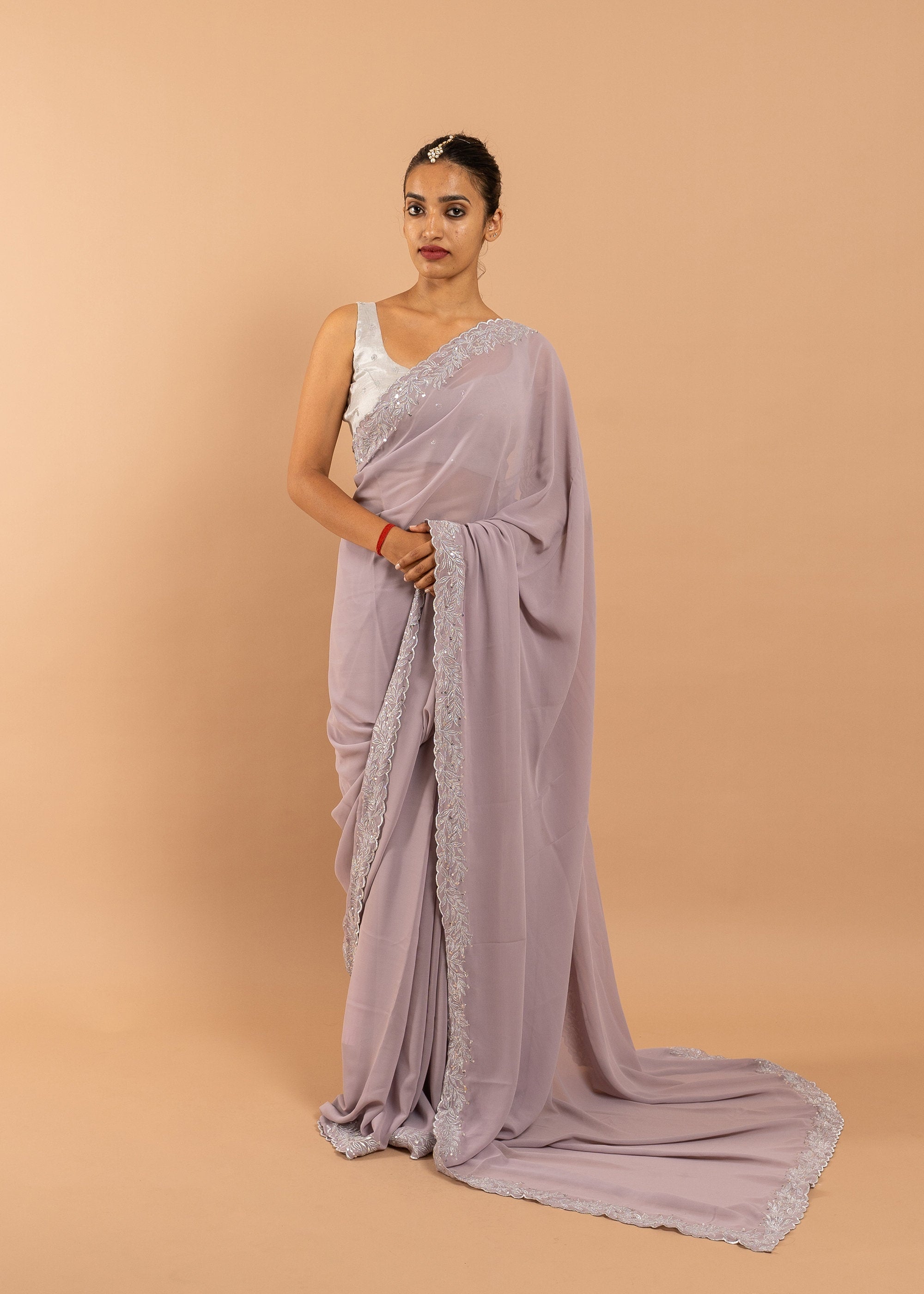 Lavender Georgette saree with silk thread and zari handwork  and beads embroidery